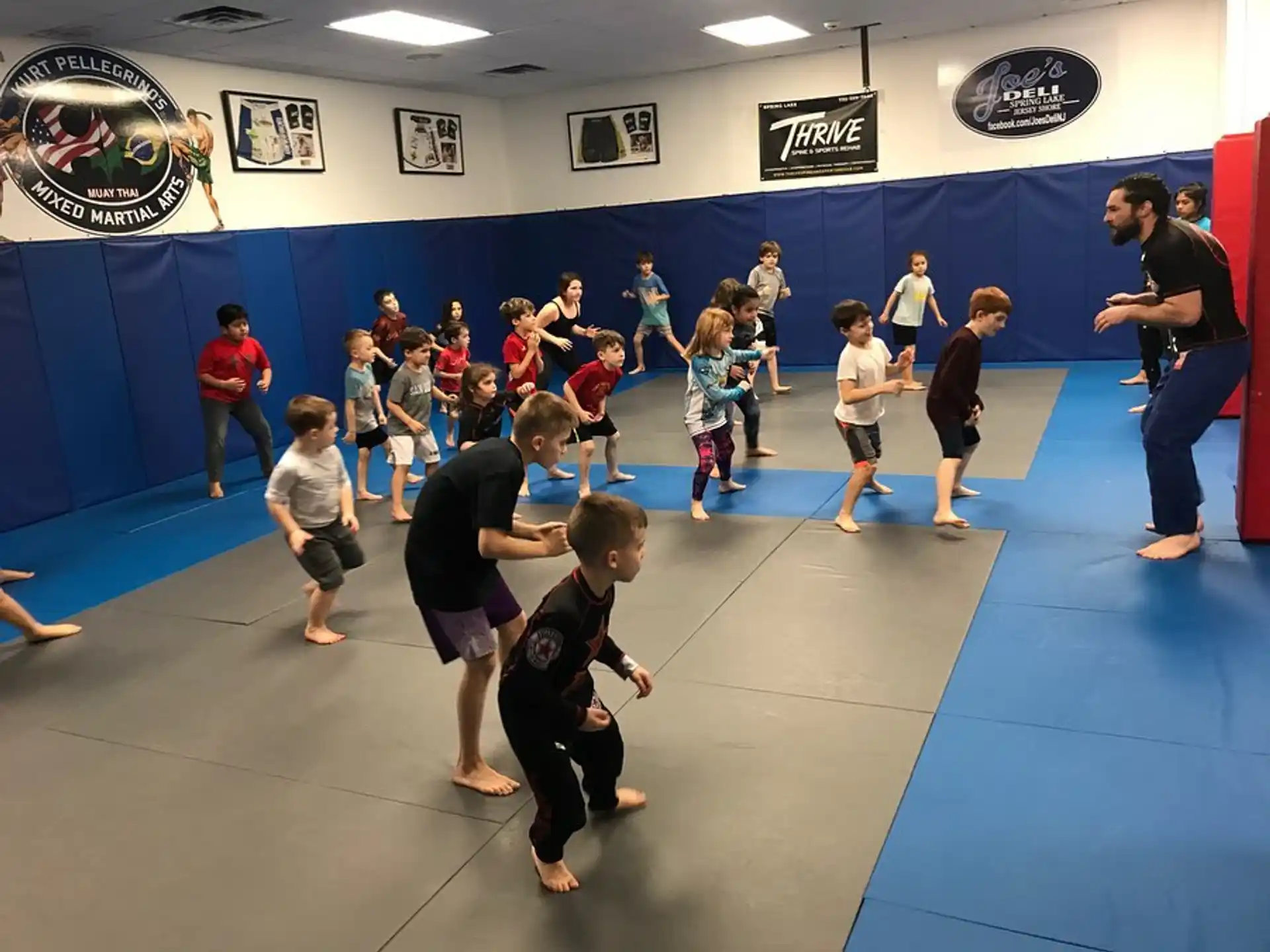 a group of children playing in a gym