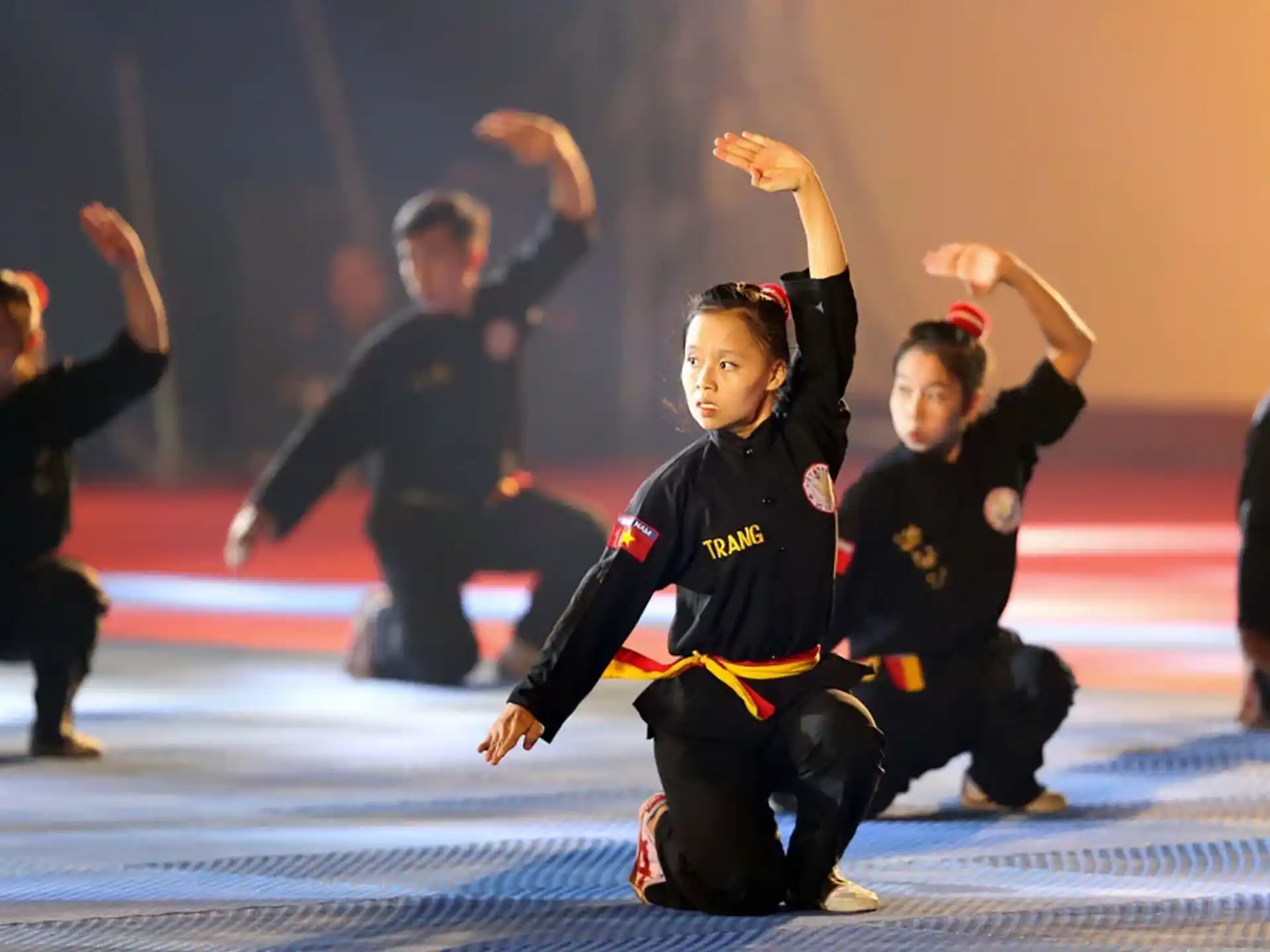 a group of people in black uniforms