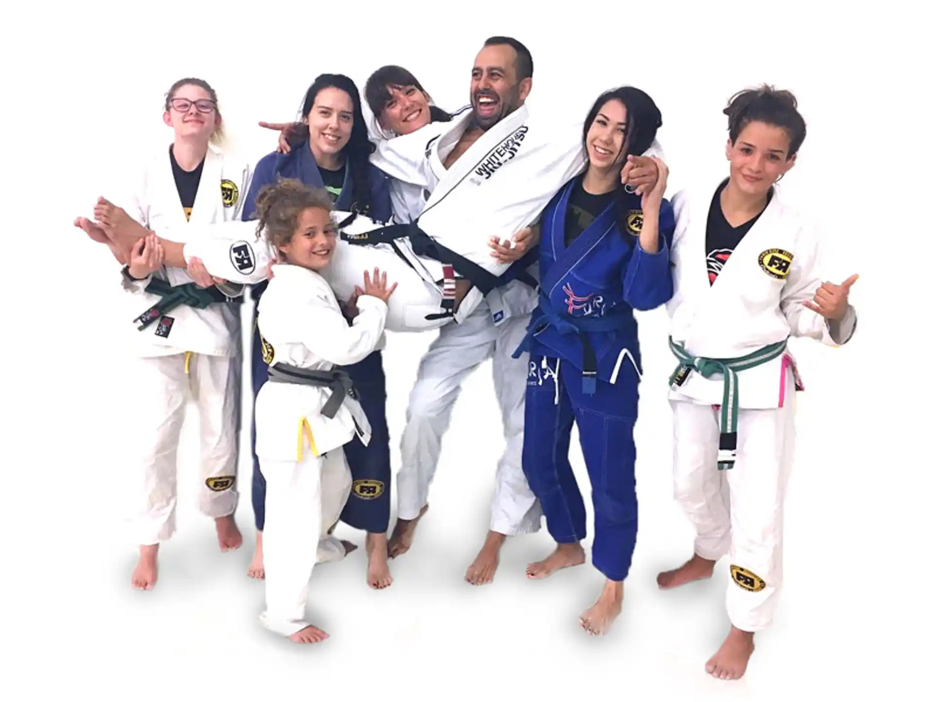 a group of people in karate uniforms