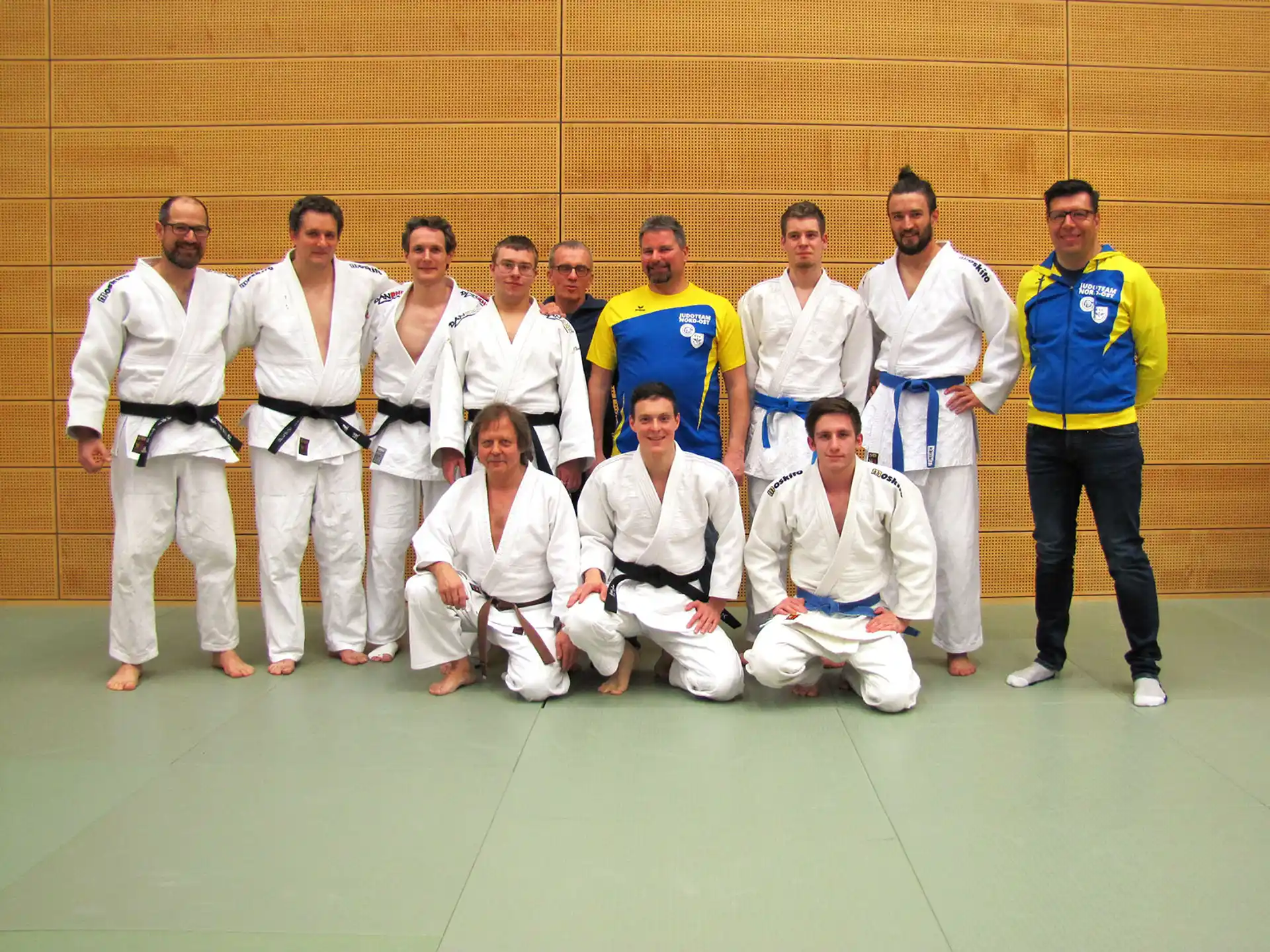 a group of people posing for a photo