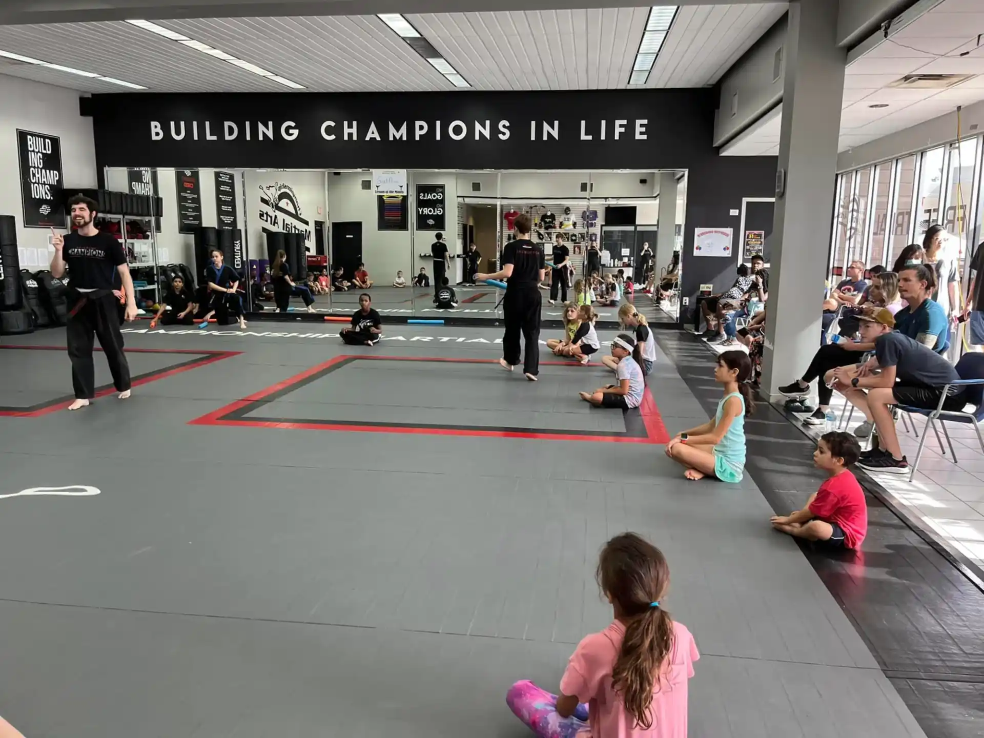 a group of people in a gym