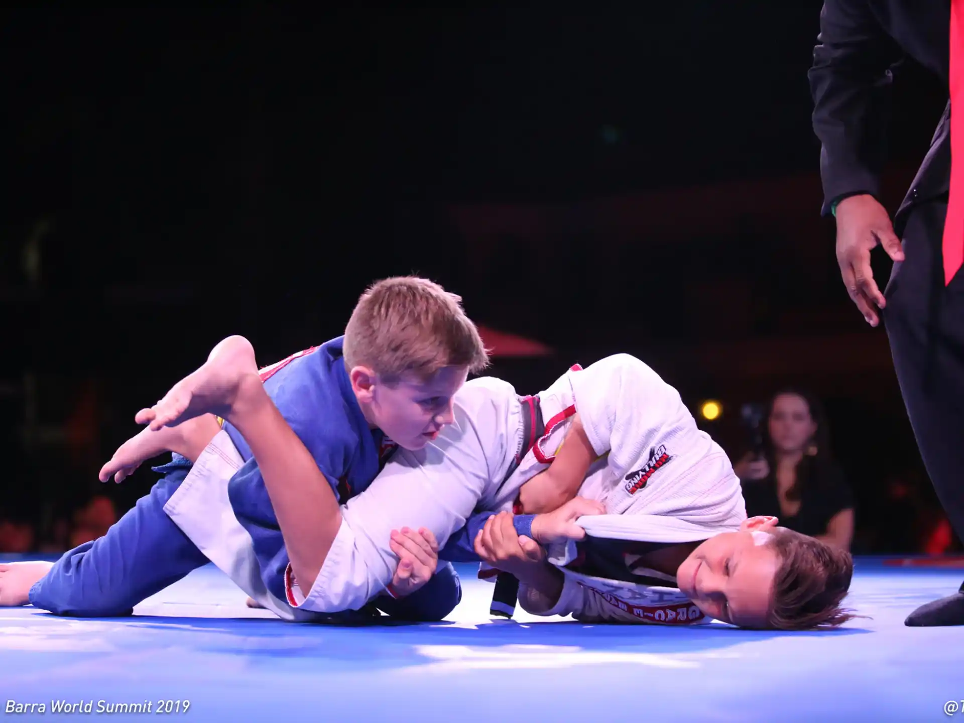 a group of men wrestling