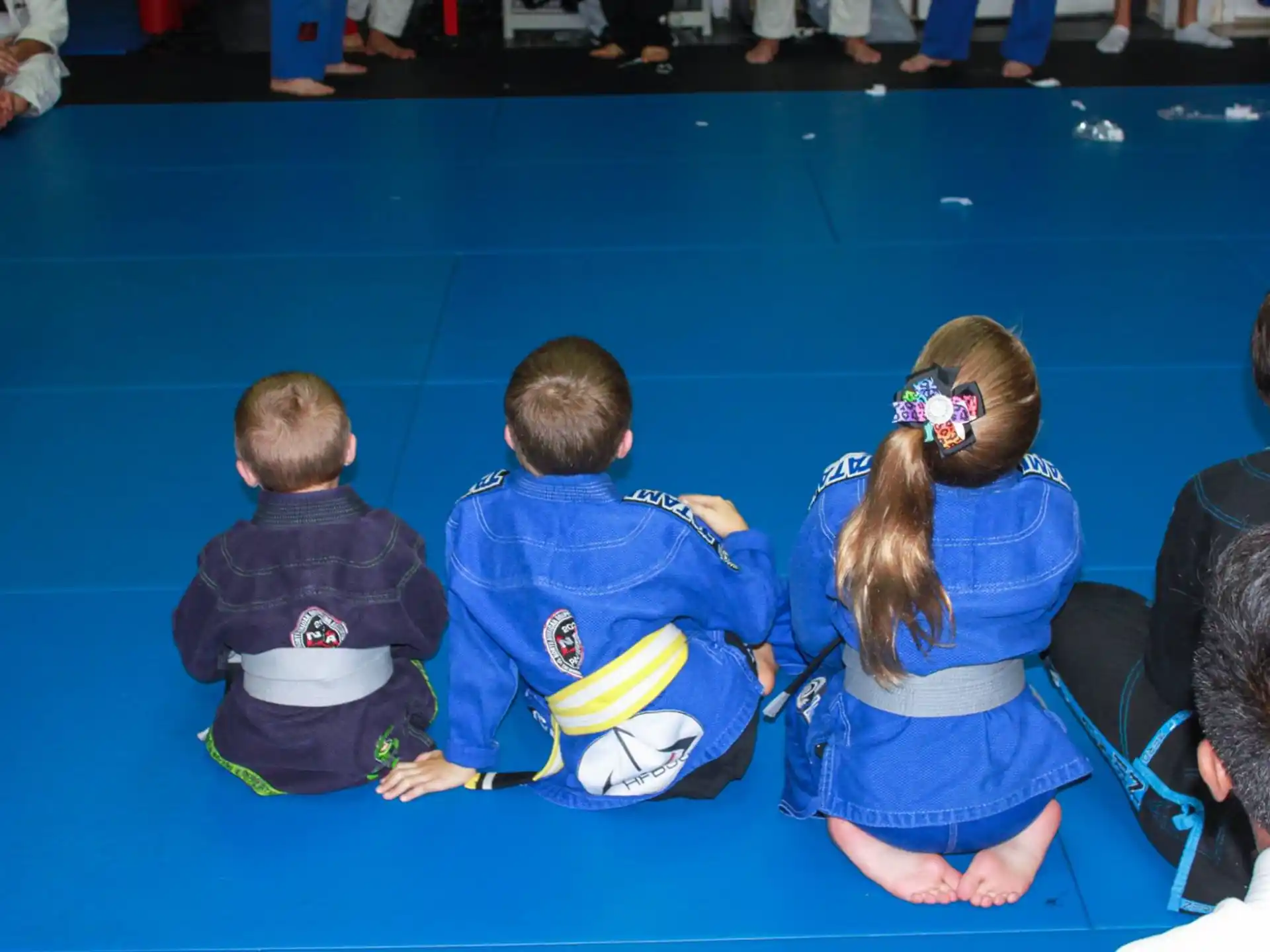 a group of children sitting on the floor