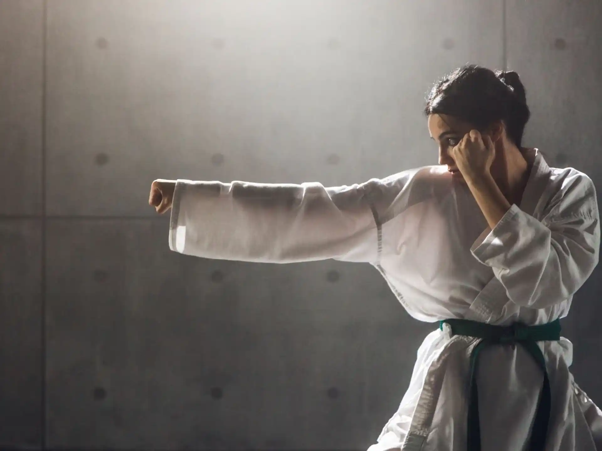 a man in a karate uniform