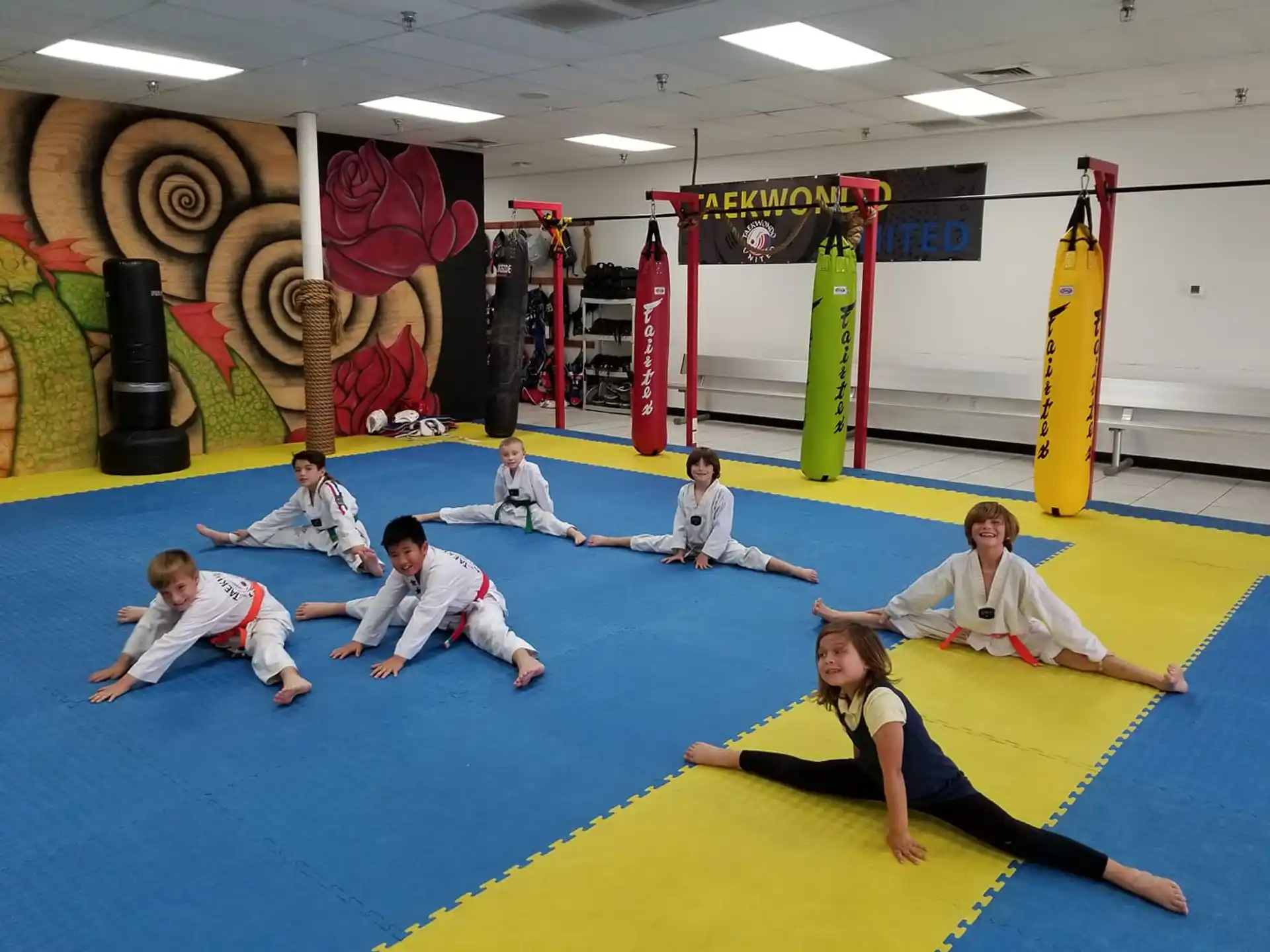 a group of people in a gym