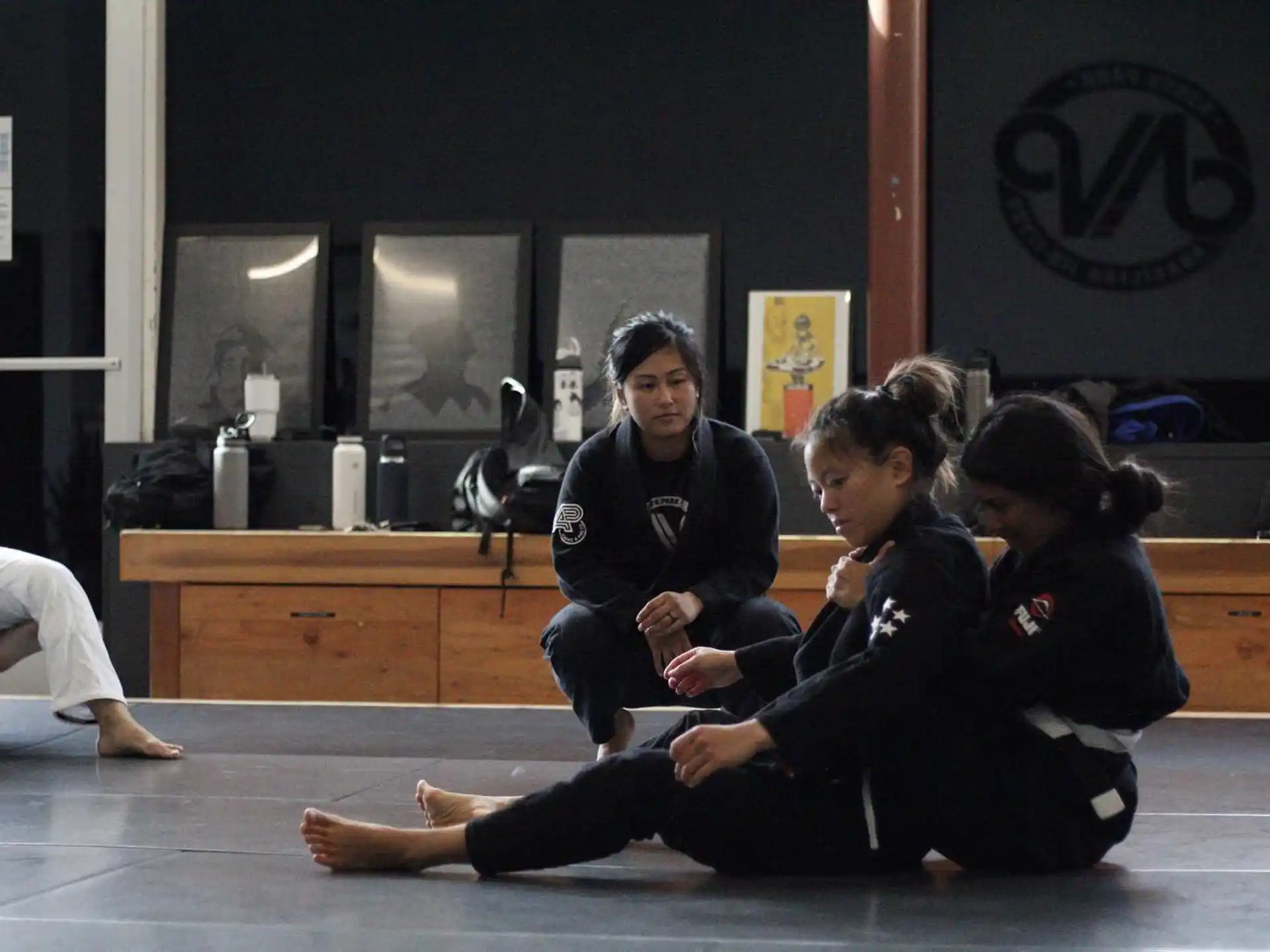 a group of women sitting on the floor
