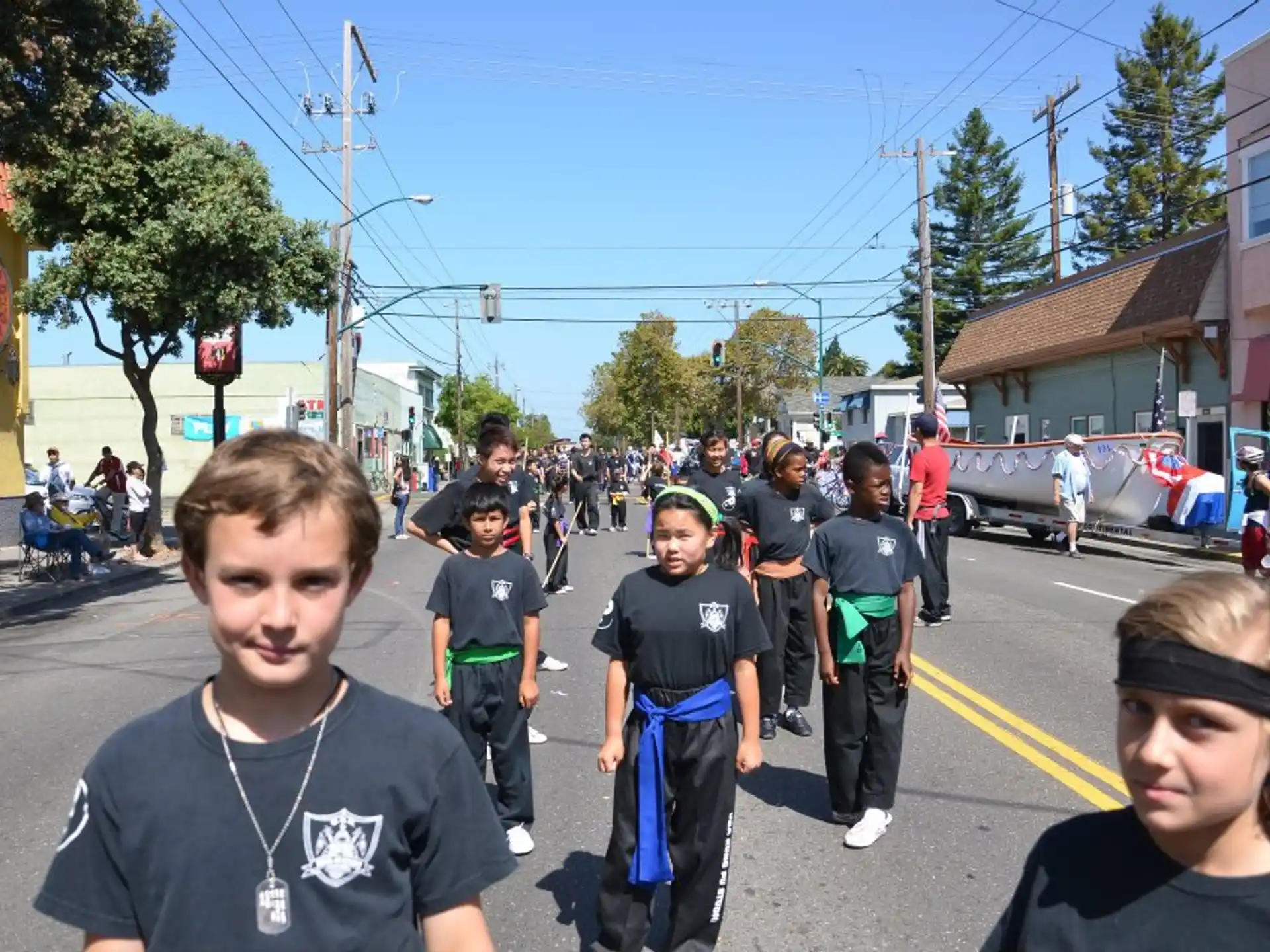 a group of people walking down a street