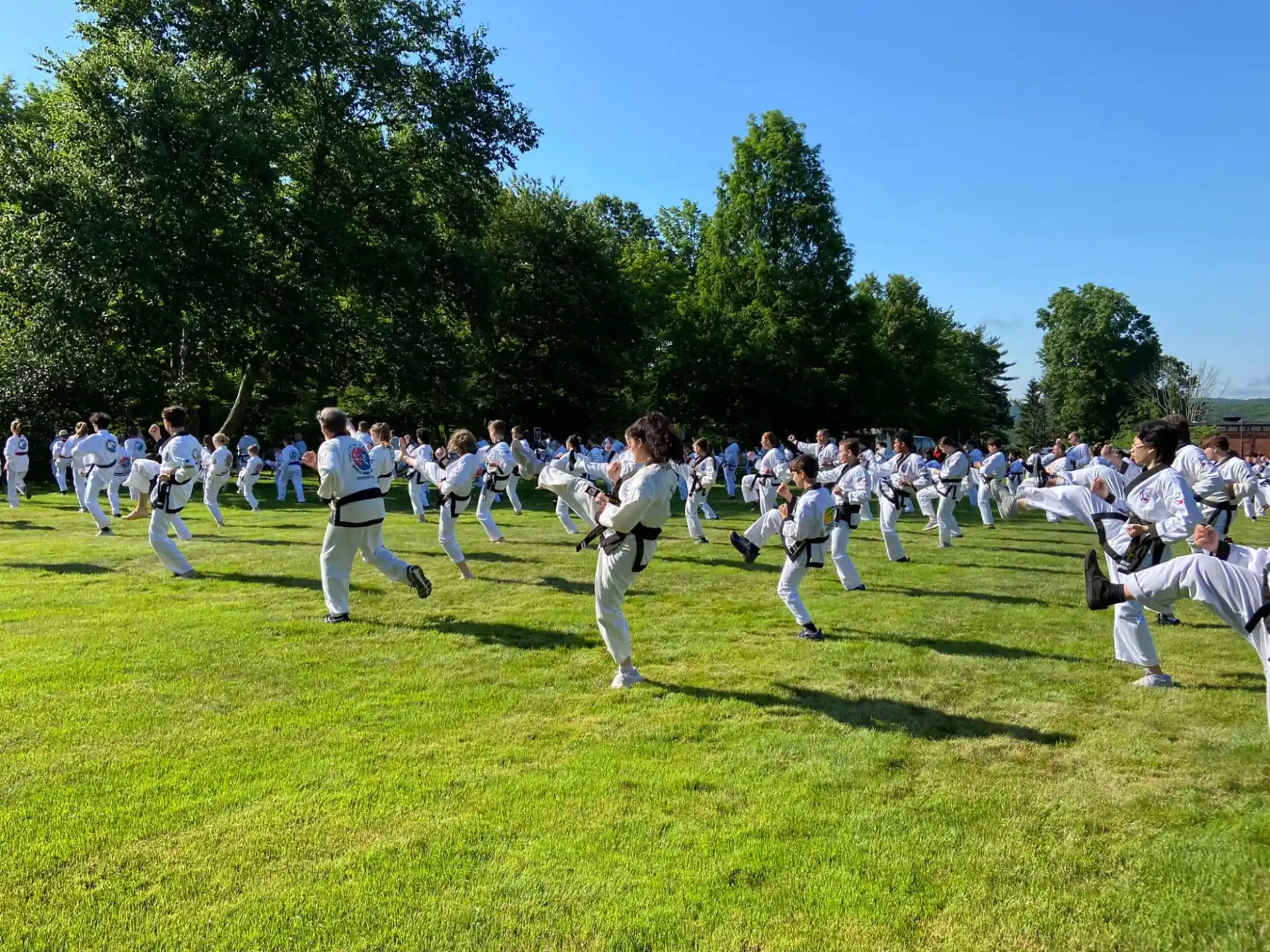 a group of people in white uniforms