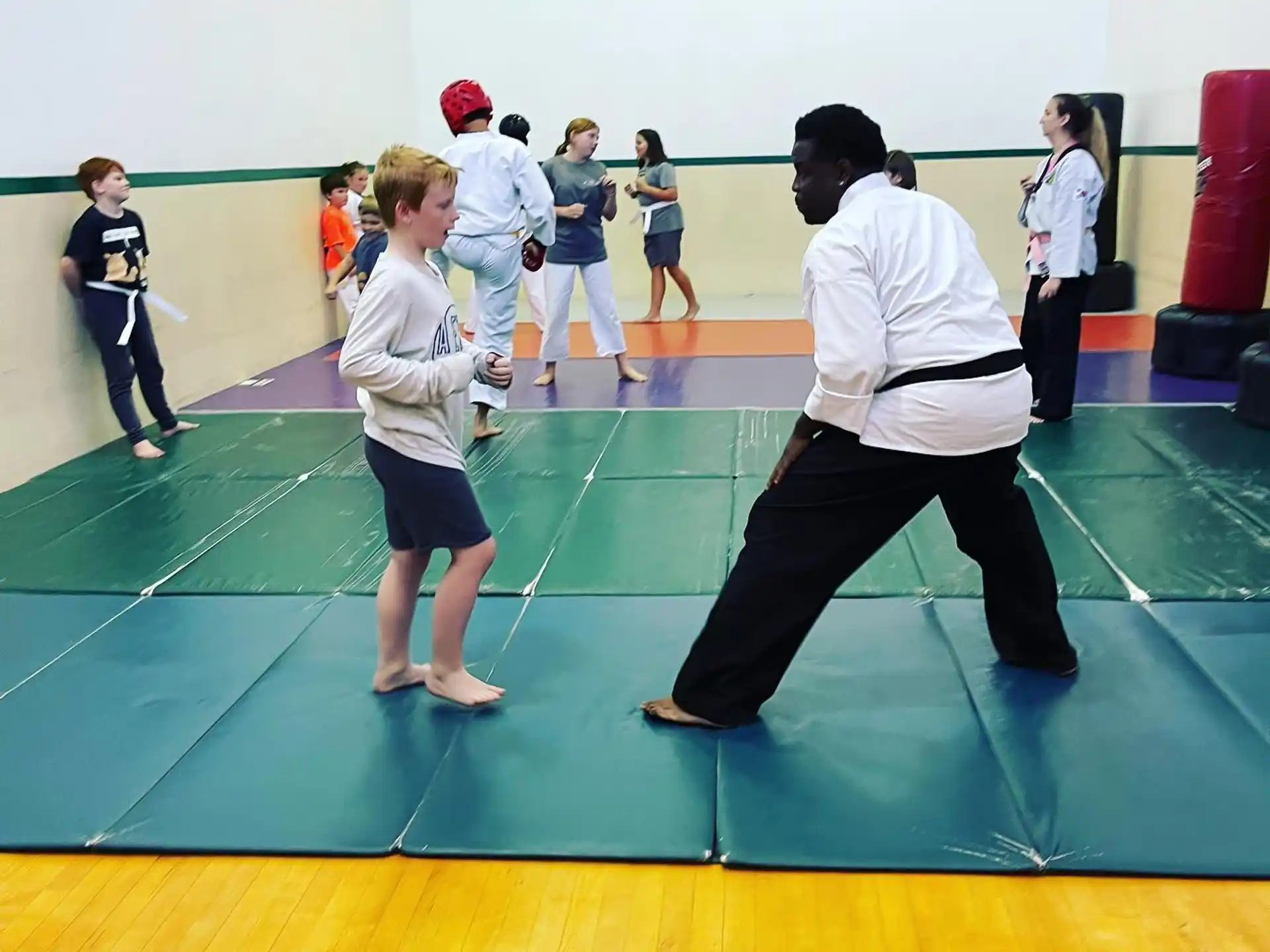 a group of people in a gym