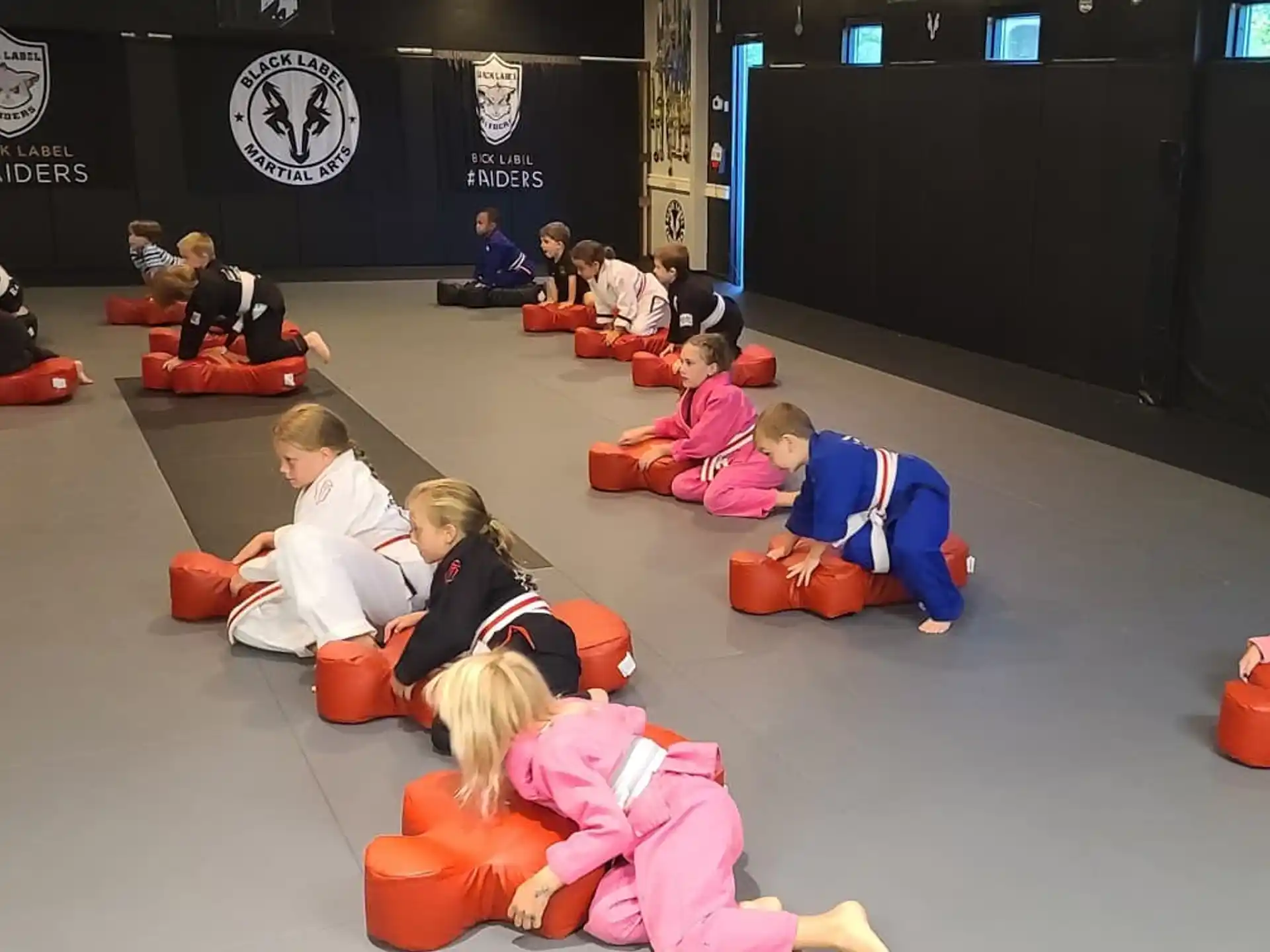 a group of people sitting on the floor