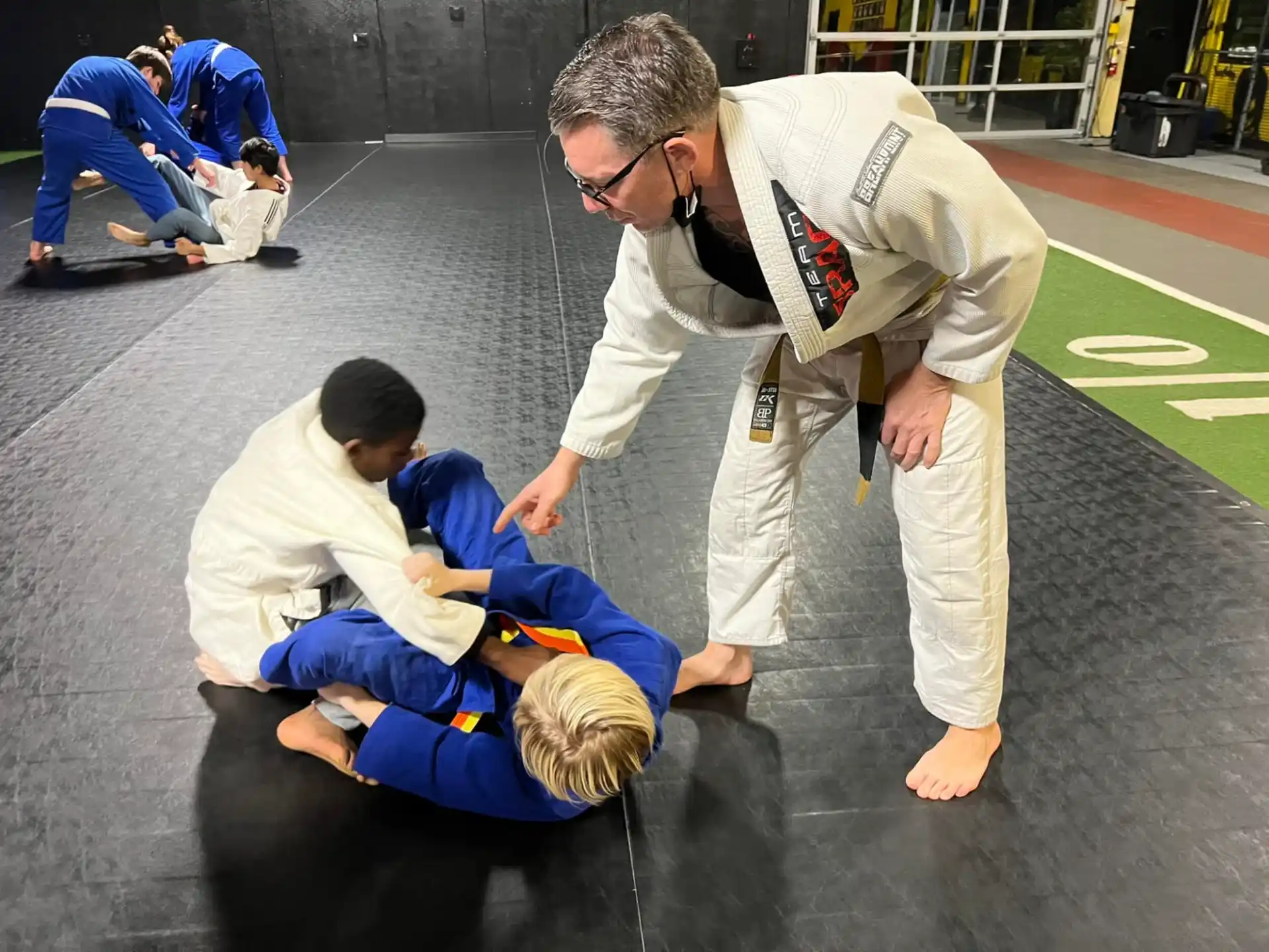 a group of people in karate uniforms