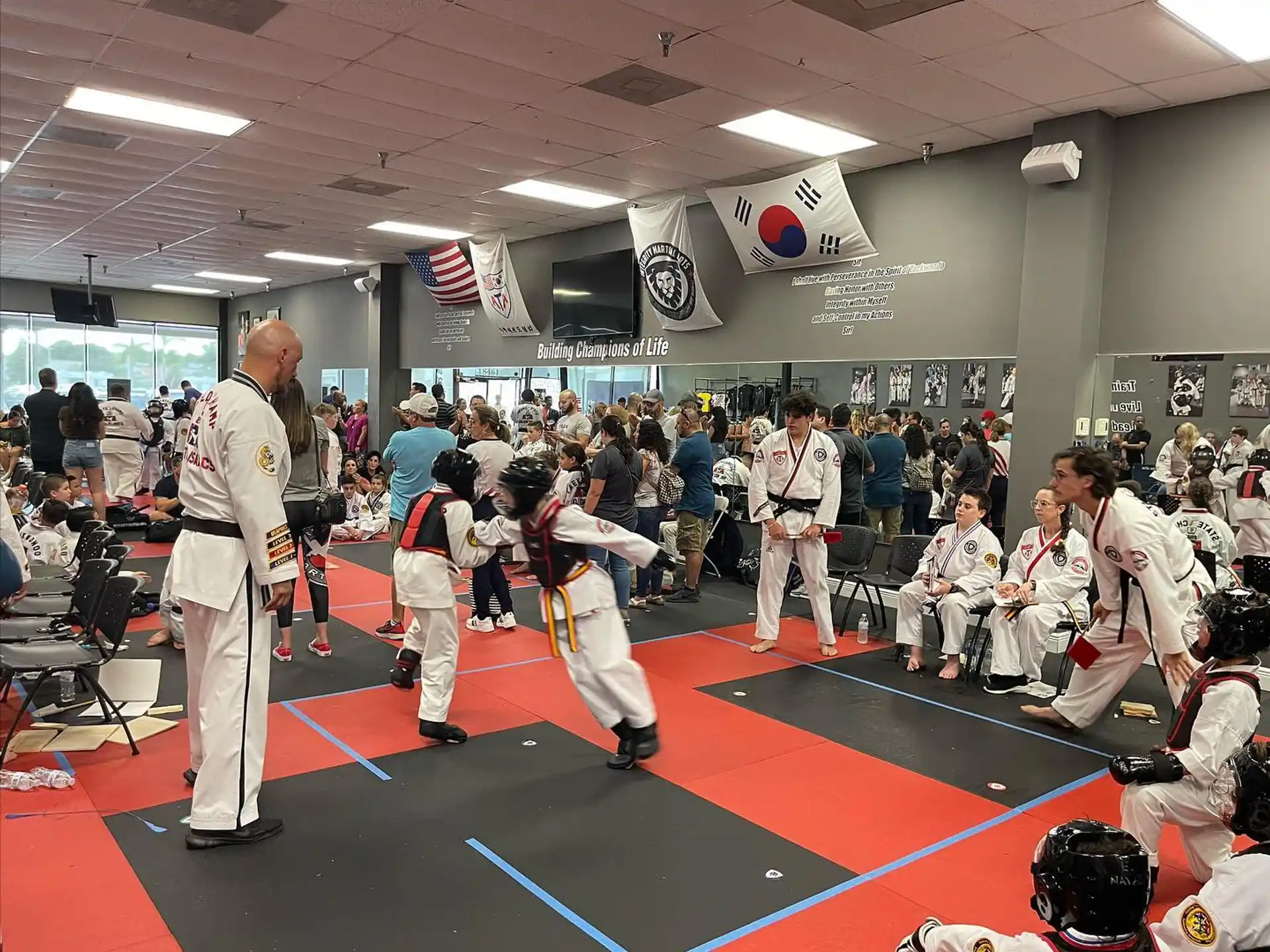 a group of people in karate uniforms
