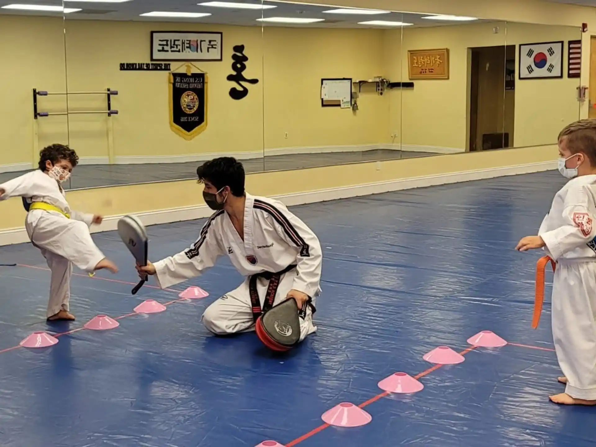 a group of people in karate uniforms