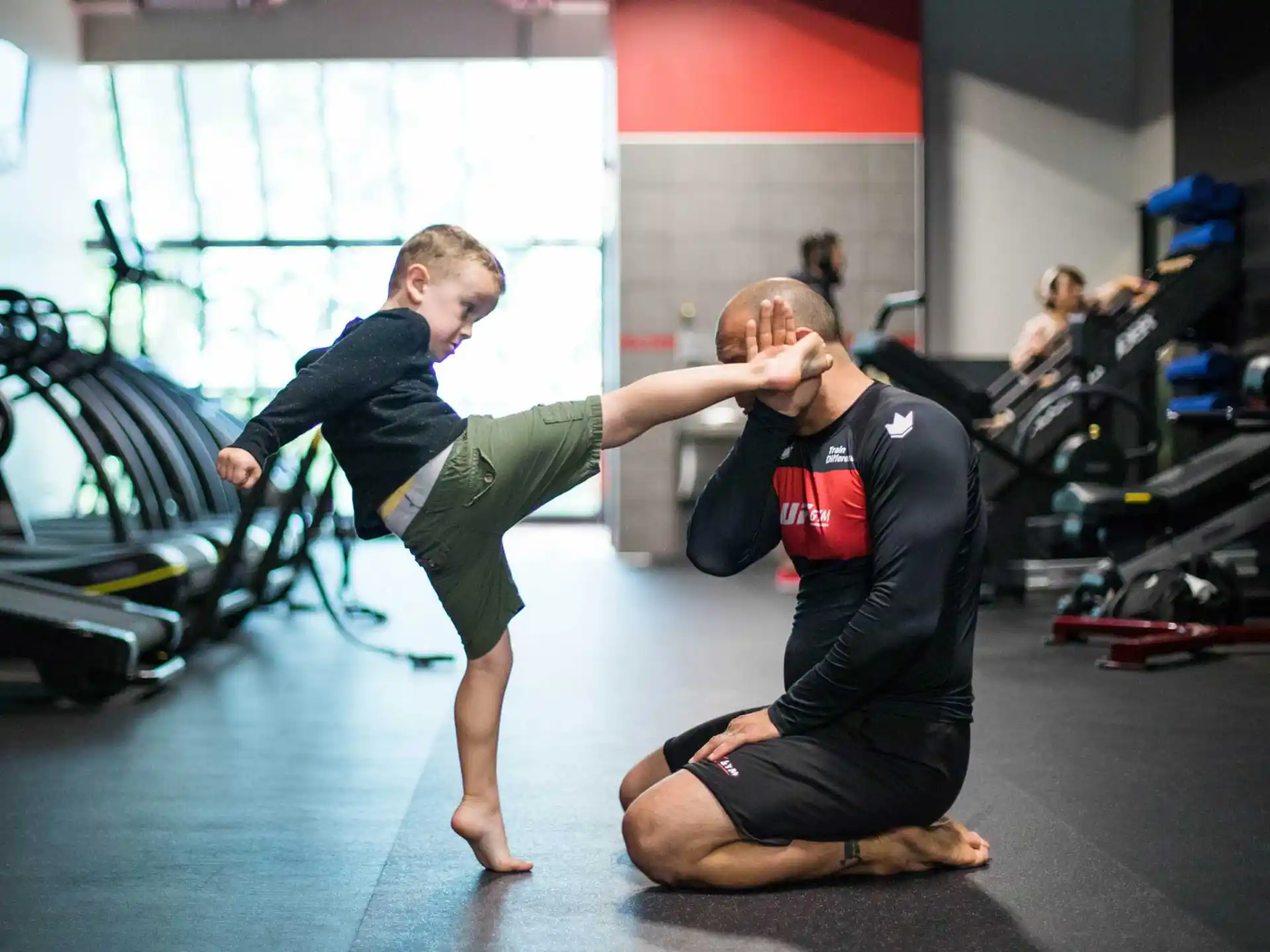 a couple of men in a gym