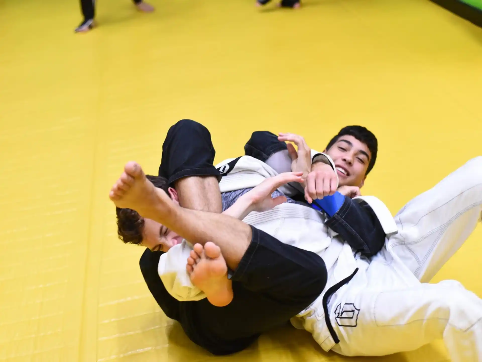 a group of men in karate uniforms
