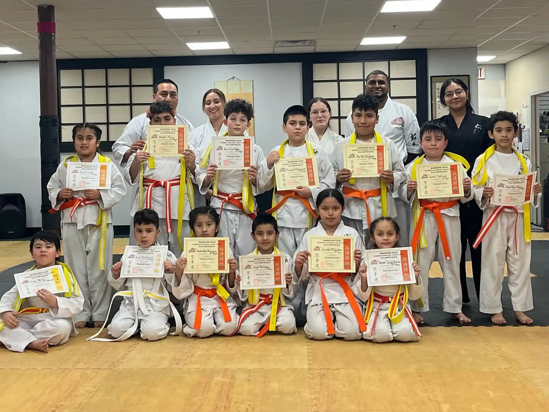 a group of people wearing karate uniforms