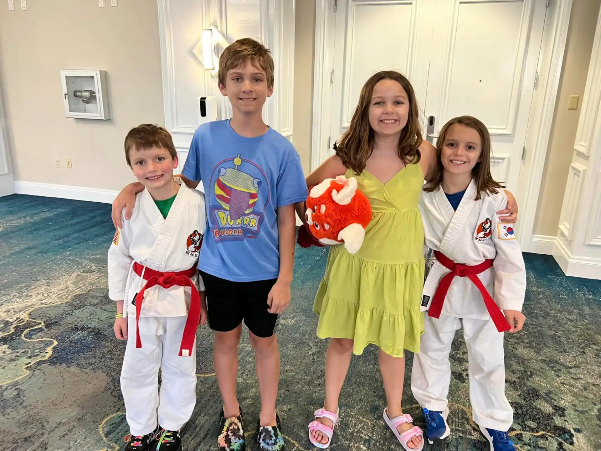 a group of children posing for a photo