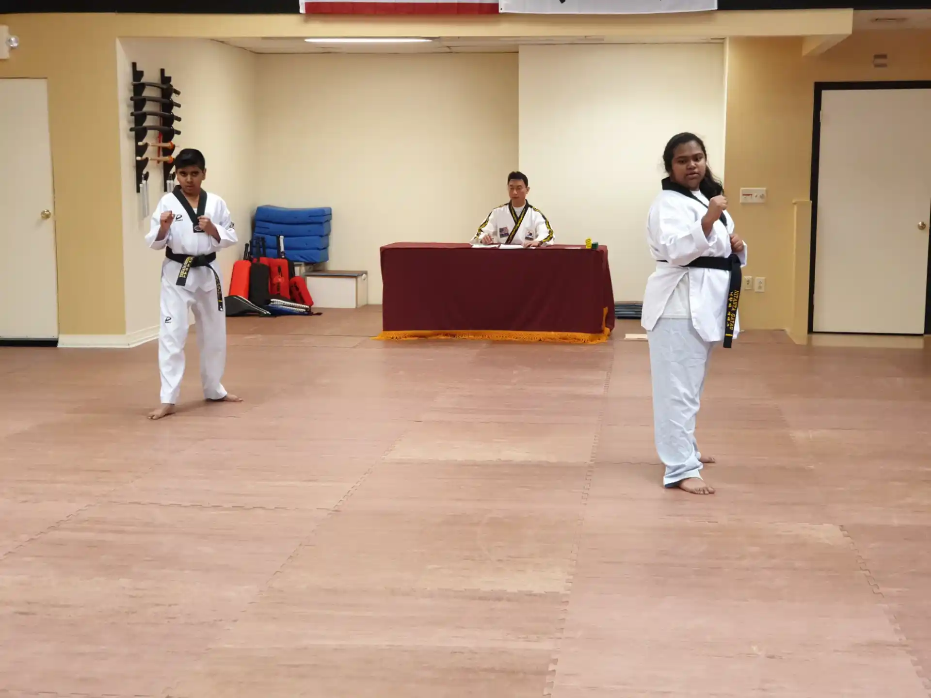 a group of people in karate uniforms