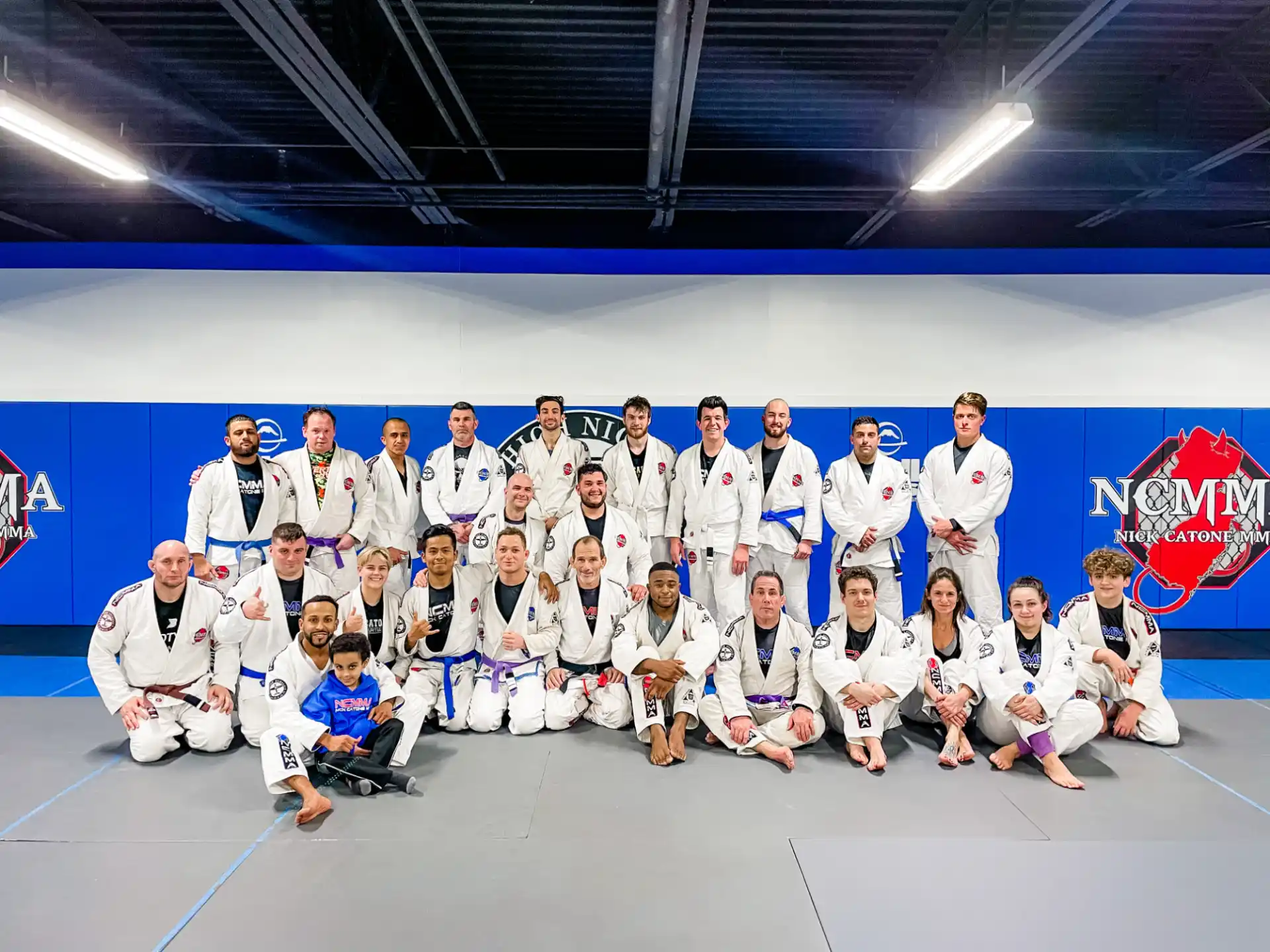 a group of people in white uniforms