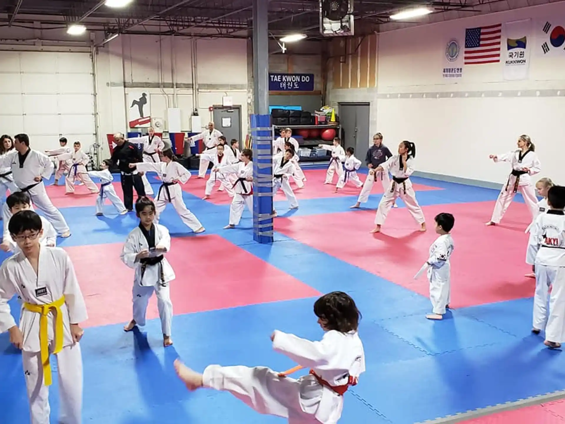 a group of people in karate uniforms