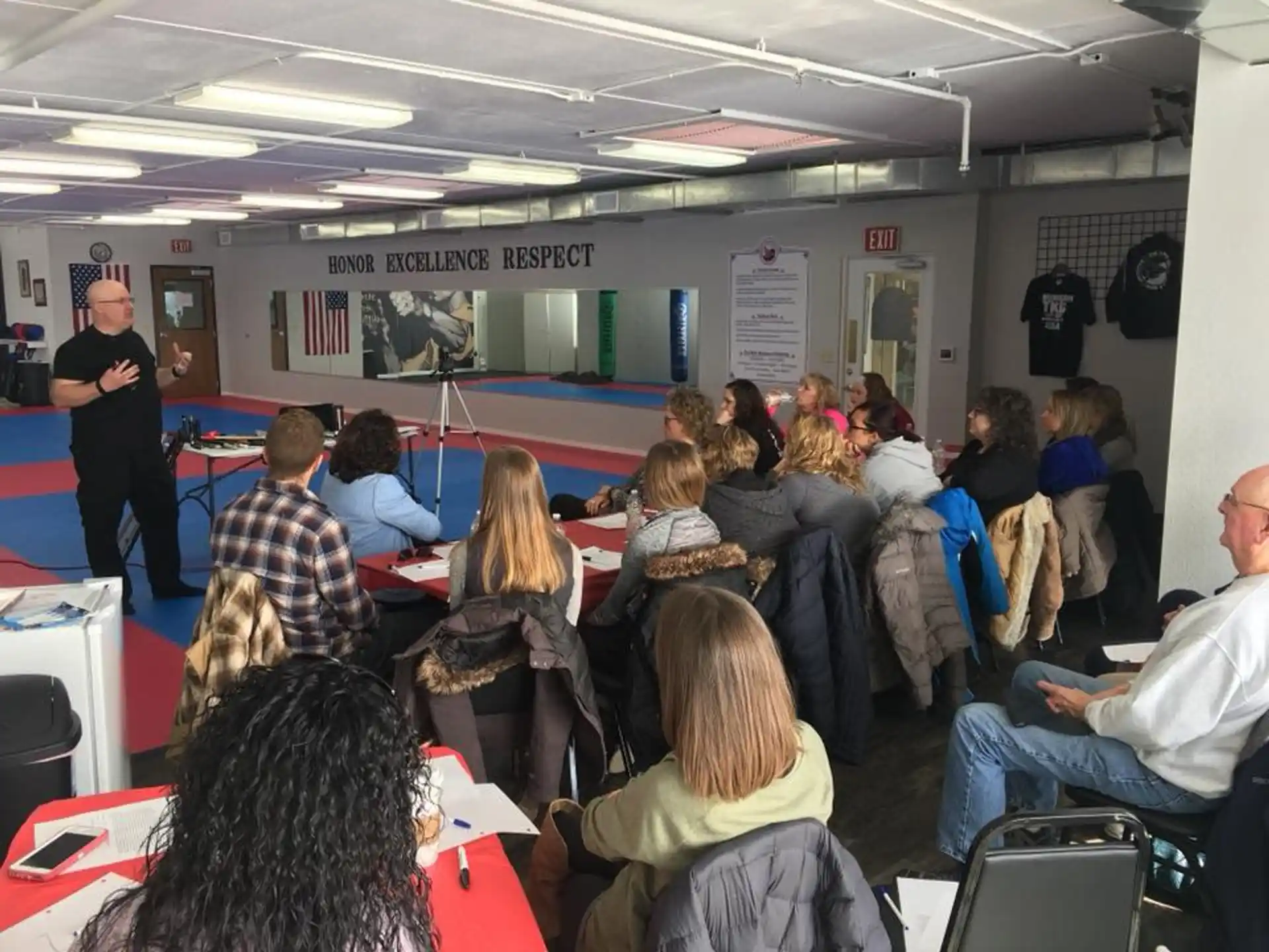 a person addressing a group of people