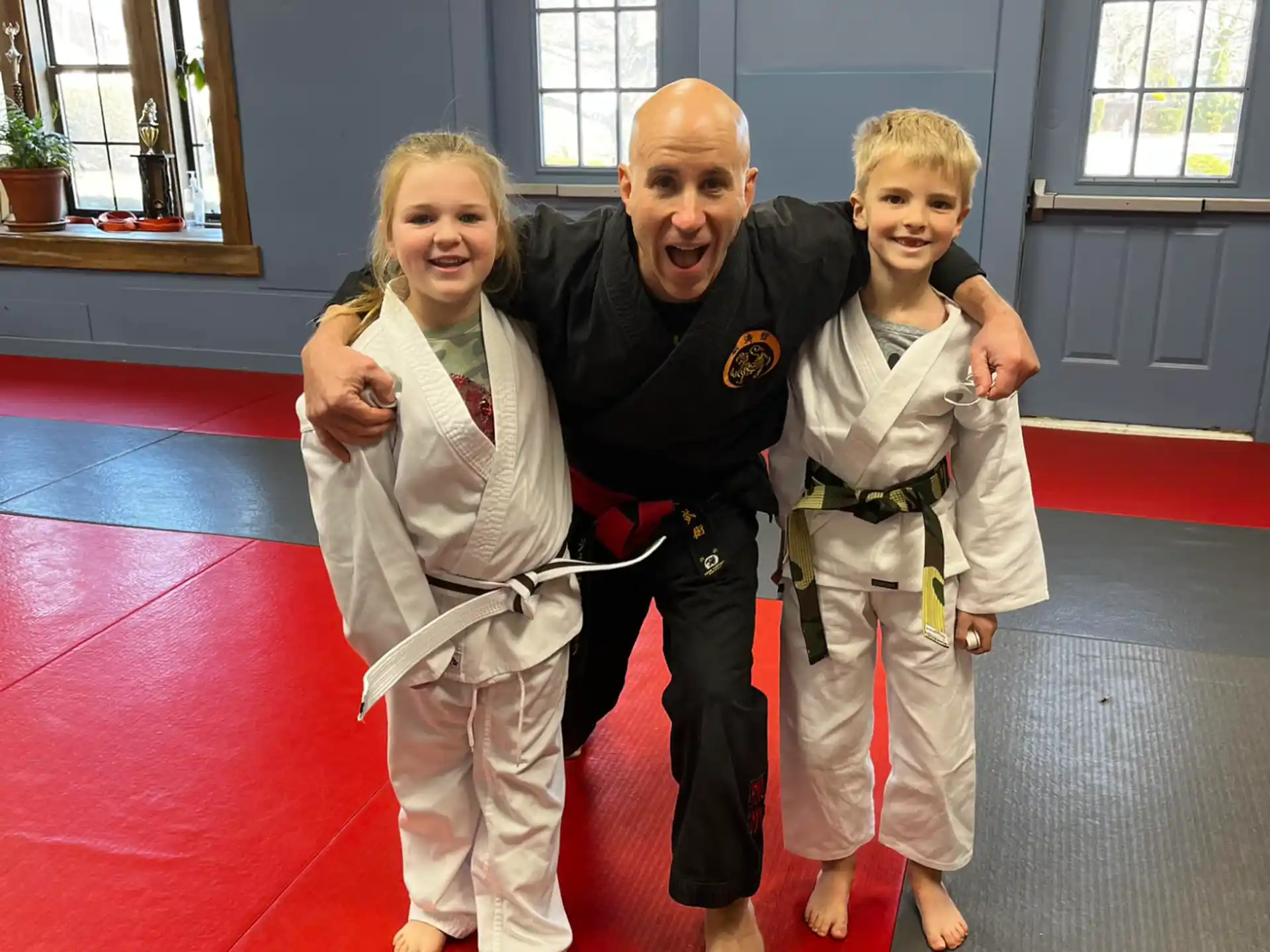 a person and two children posing for a photo