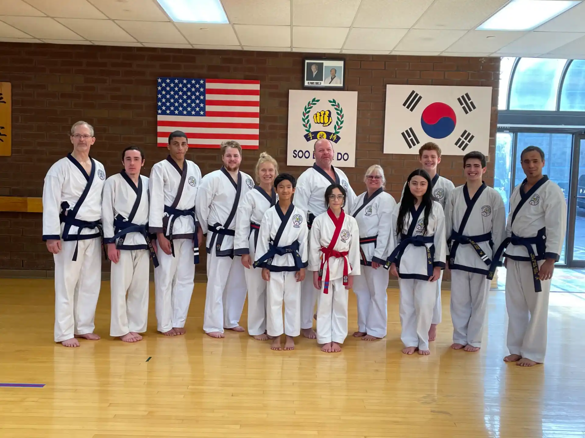 a group of people in karate uniforms