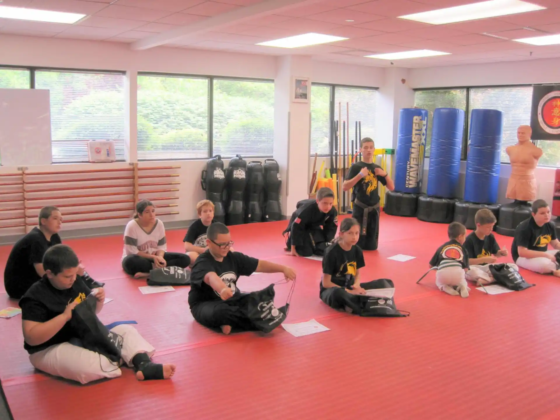 a group of people sitting on the floor