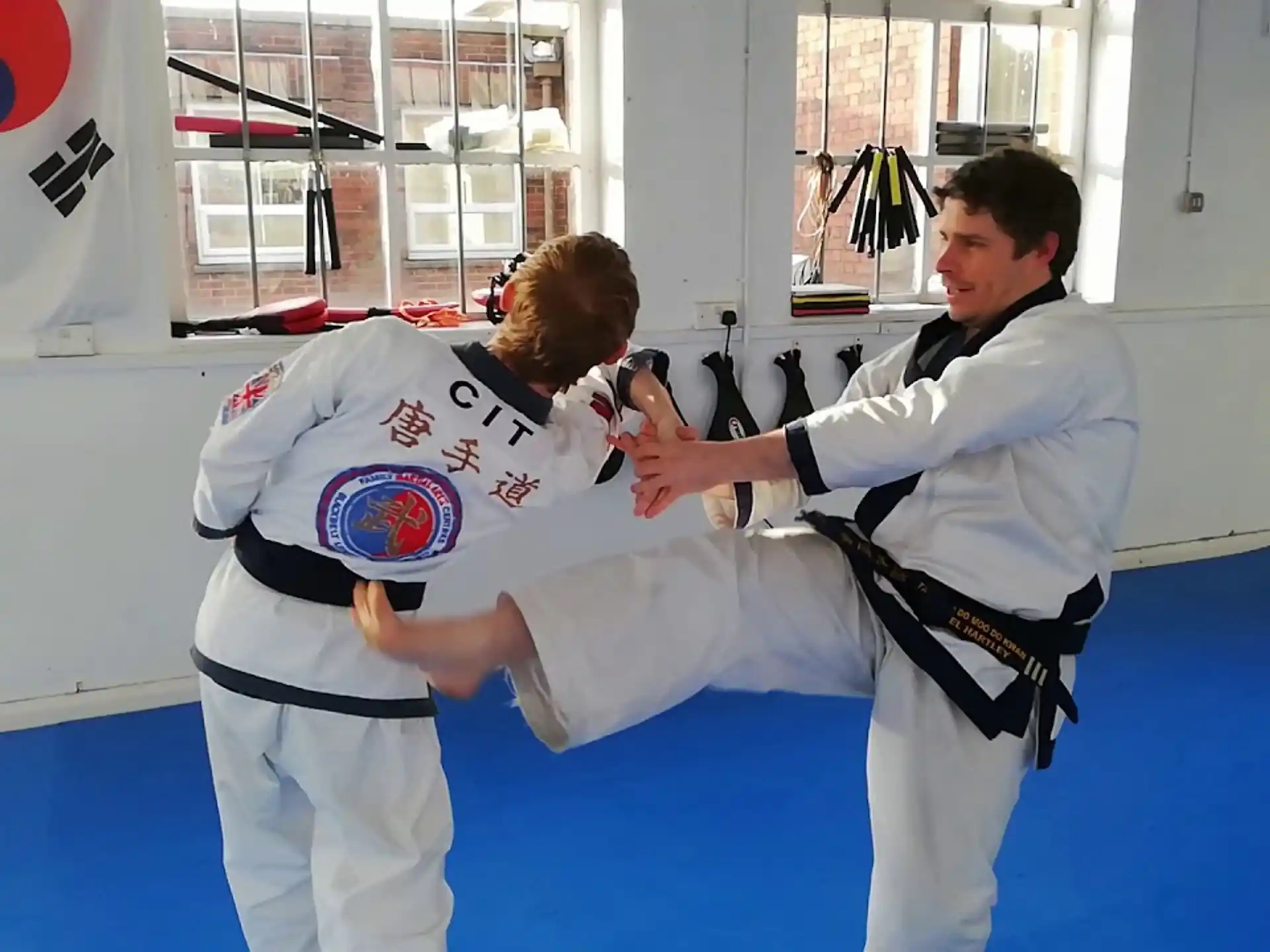 two people in karate uniforms