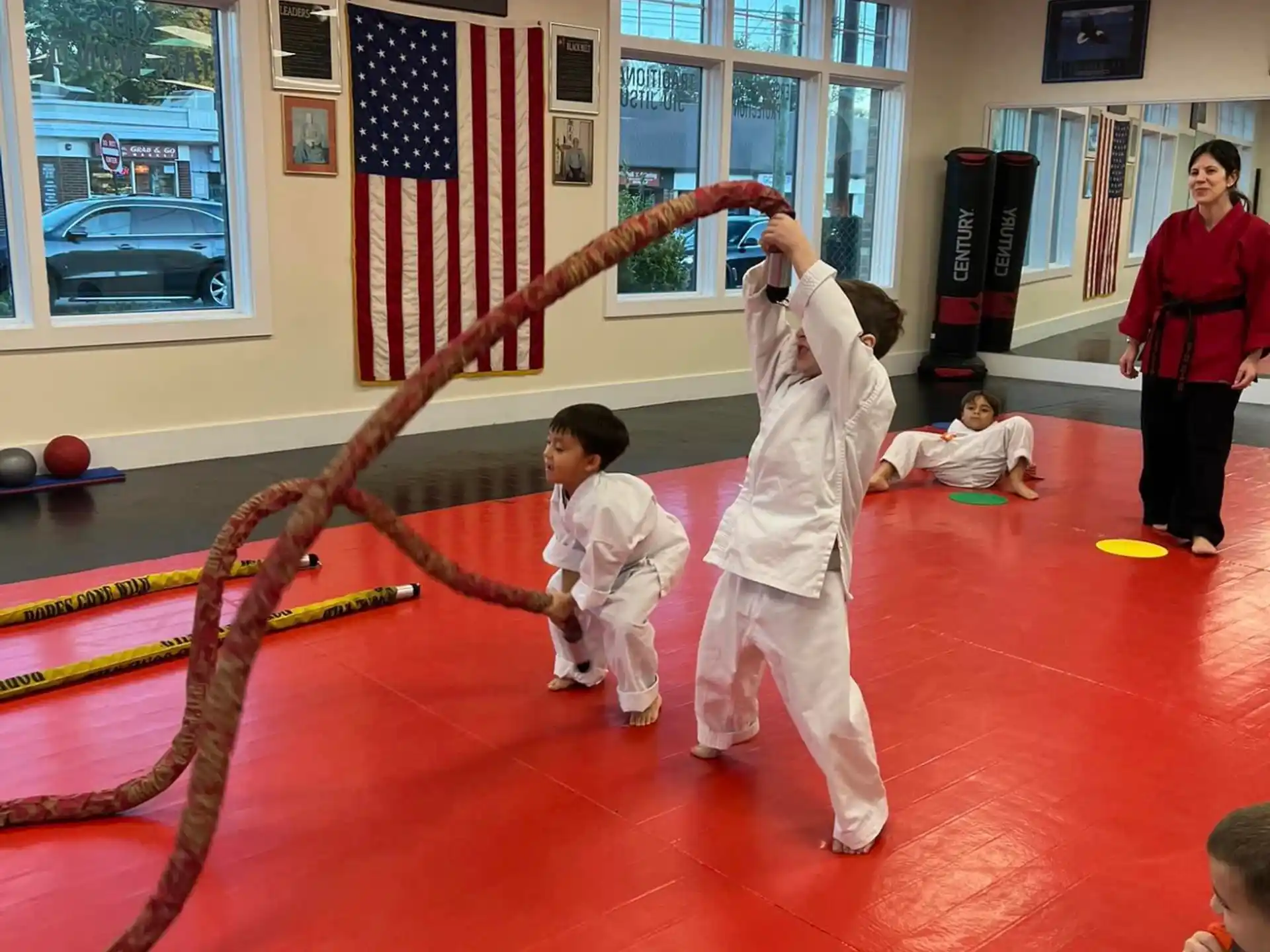 a group of kids practicing martial arts