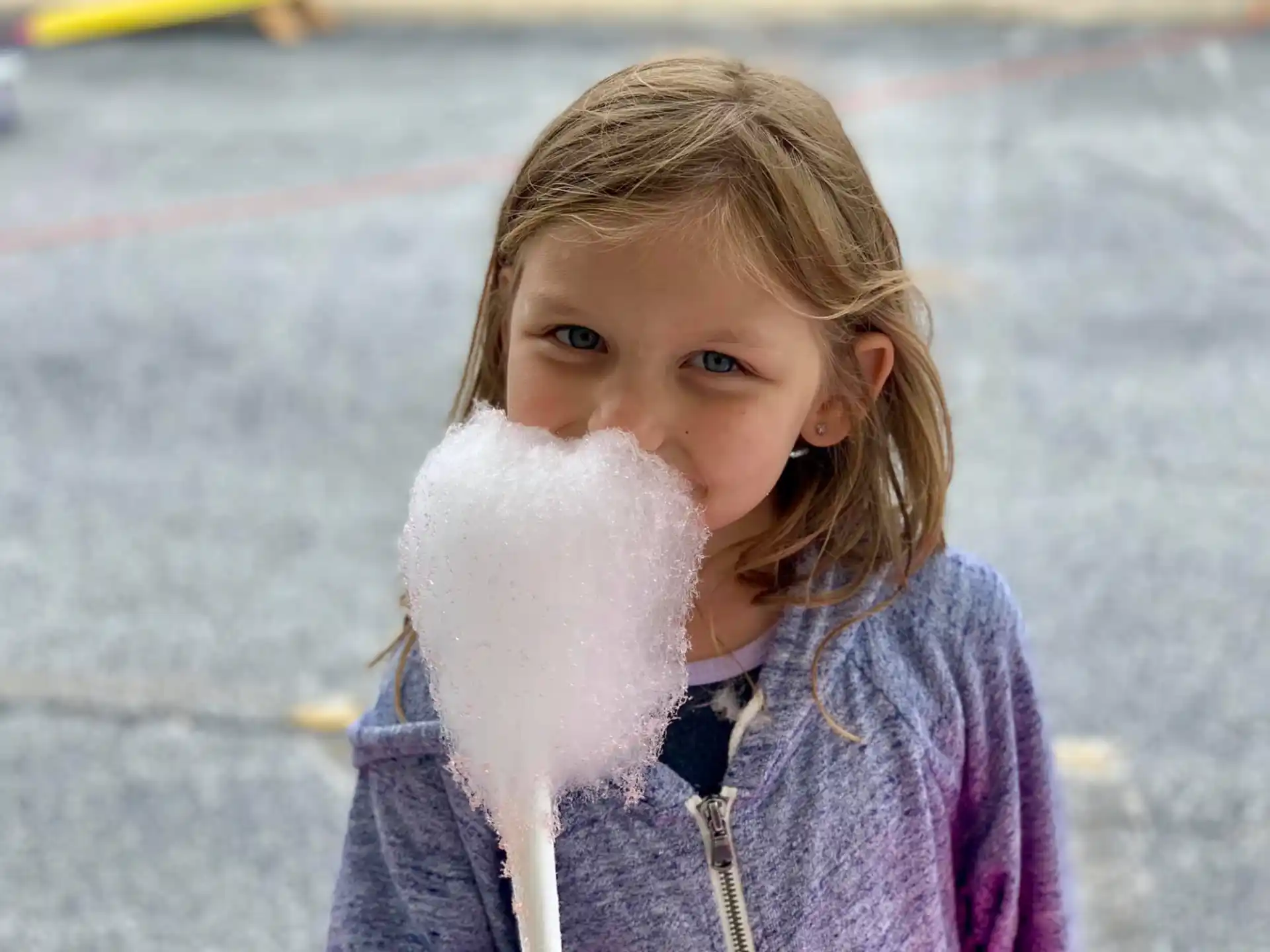 a girl holding a snowball