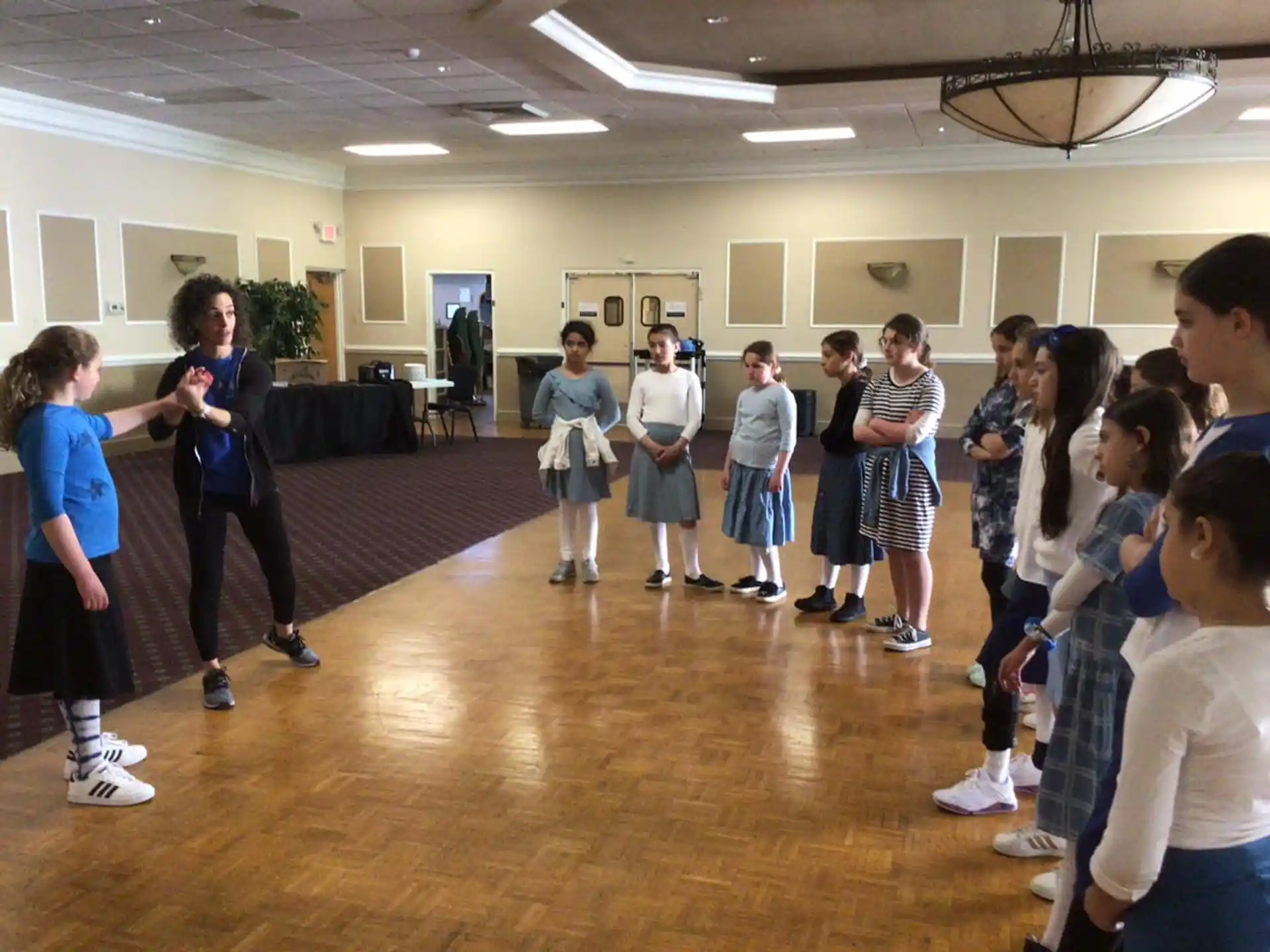 a group of people in a gym