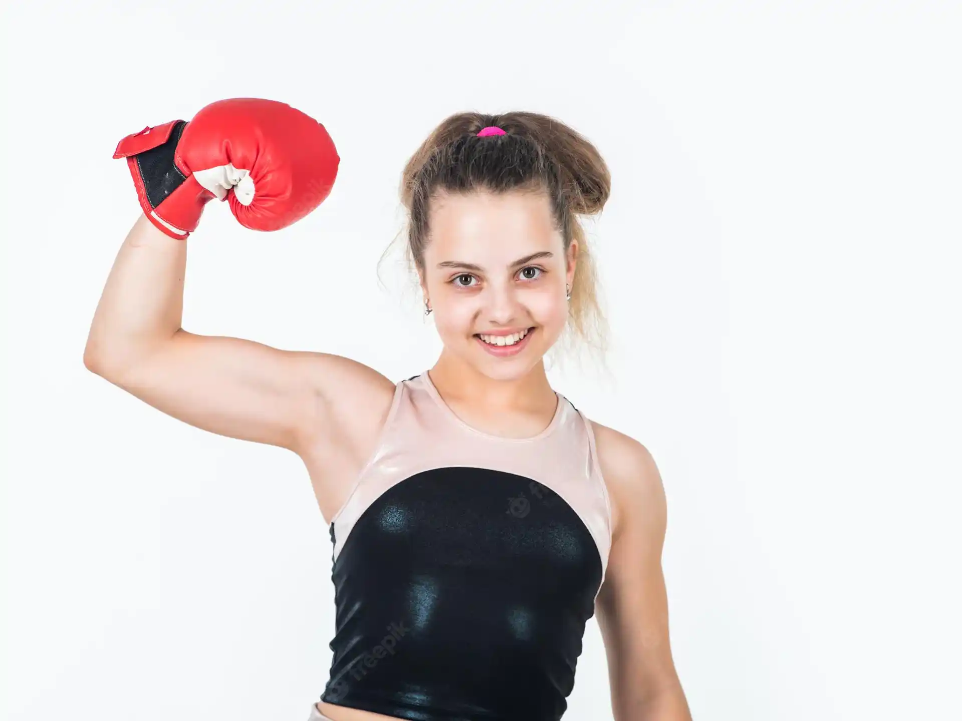 a woman wearing boxing gloves