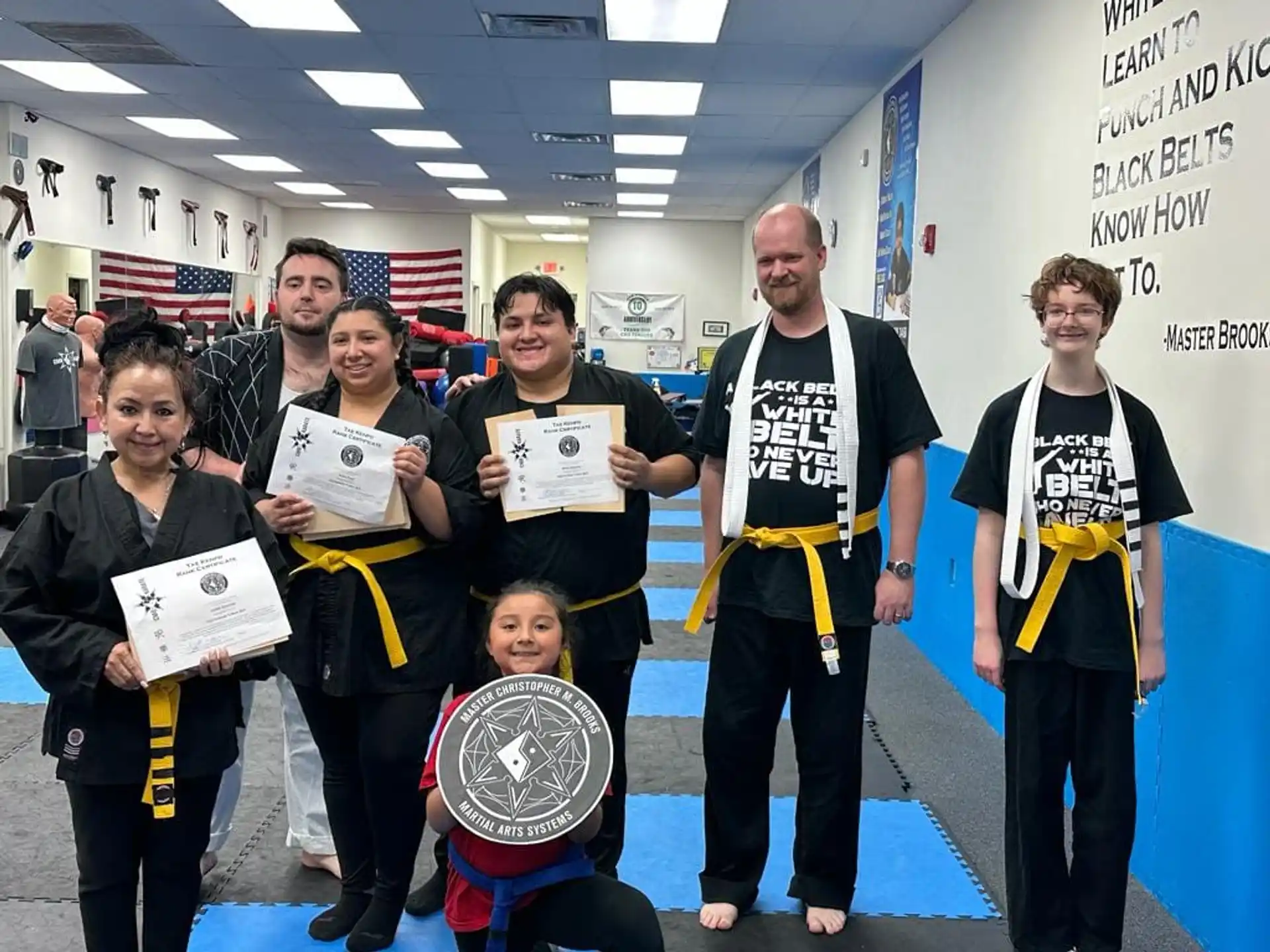 a group of people holding awards
