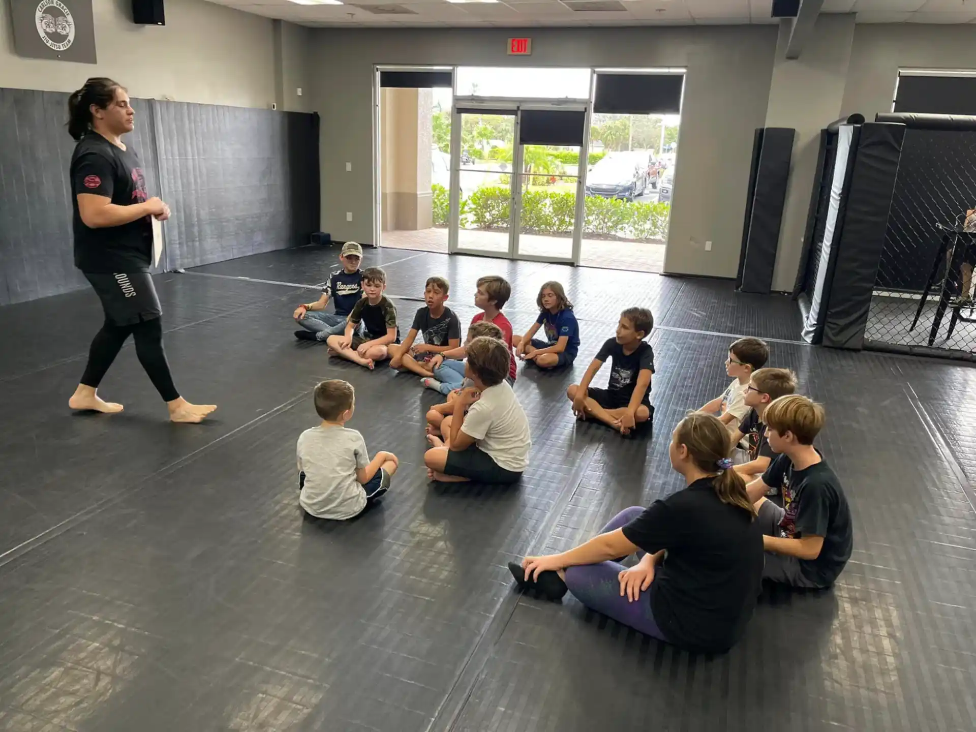 a person teaching a group of children