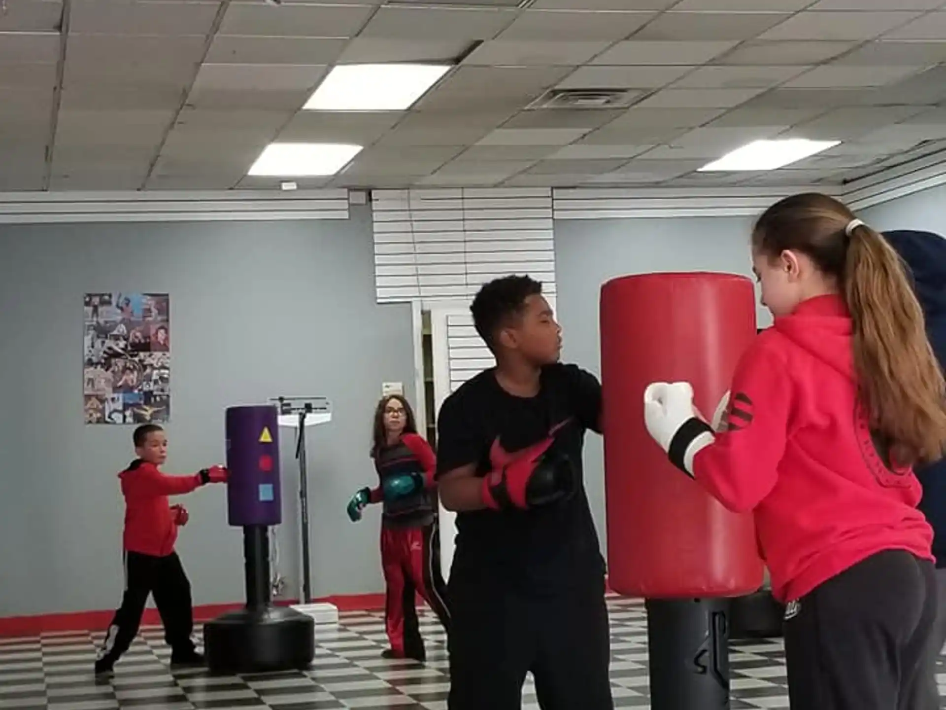 a group of people in a gym