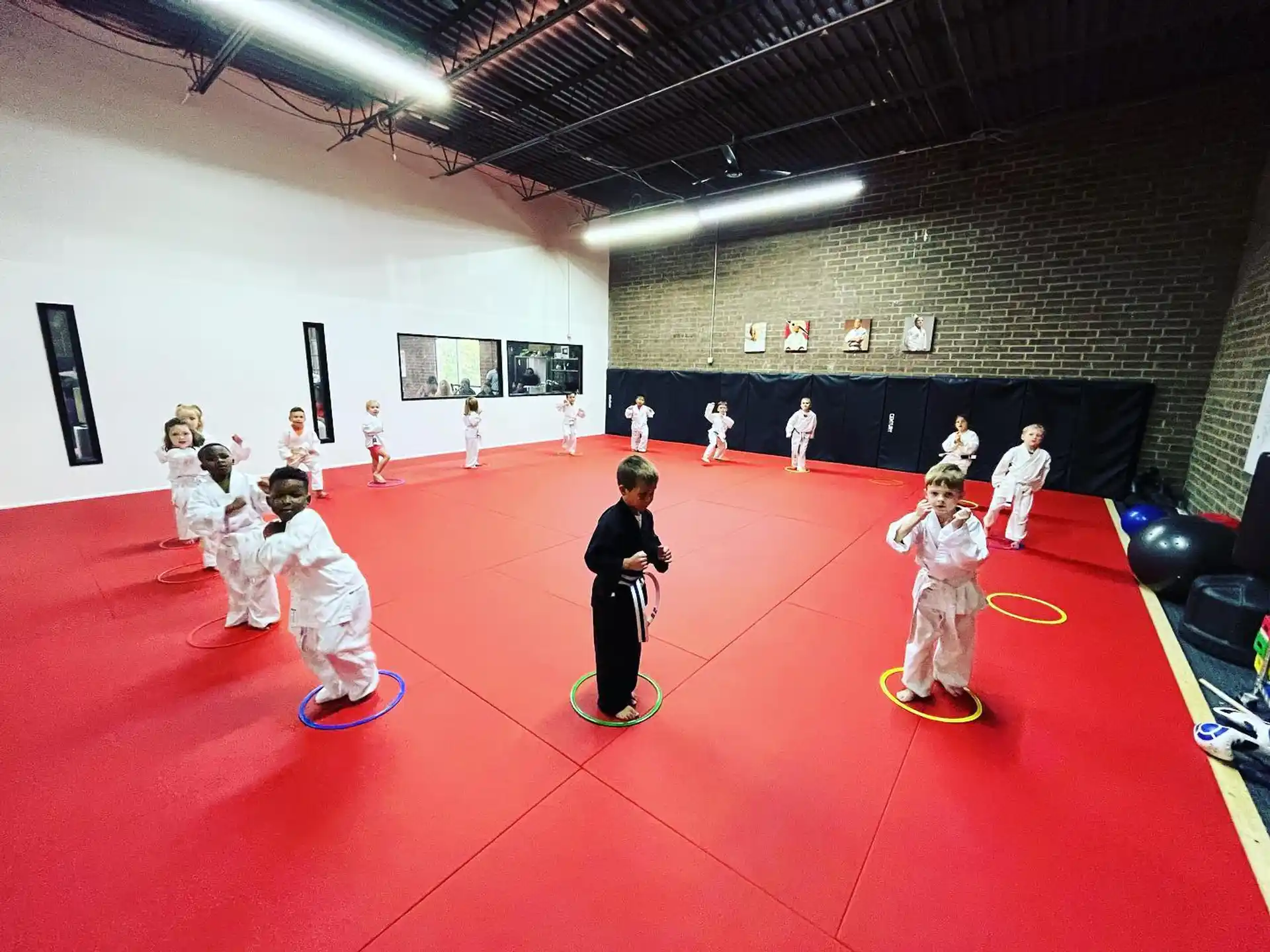 a group of children in a karate class