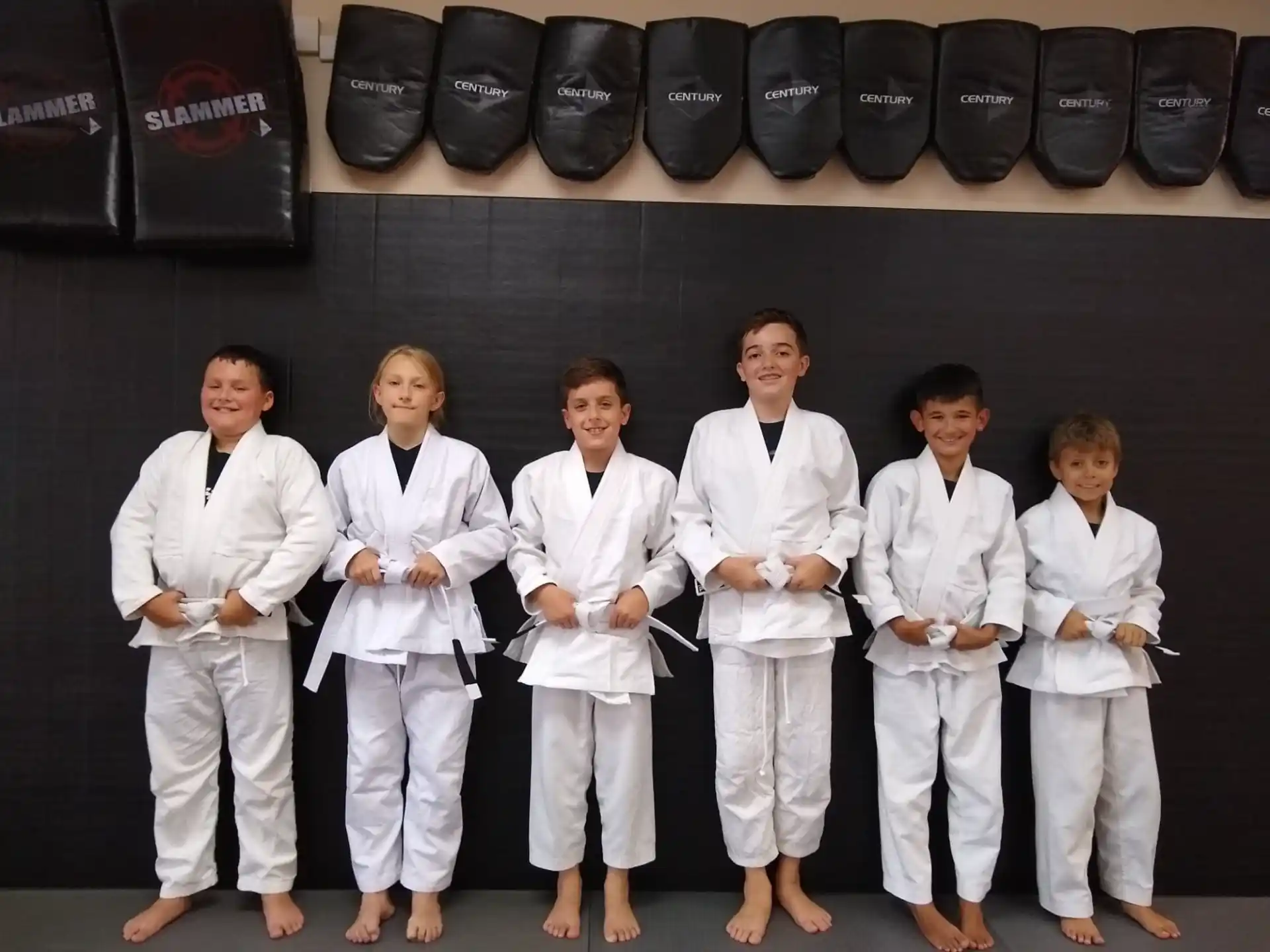 a group of people in karate uniforms