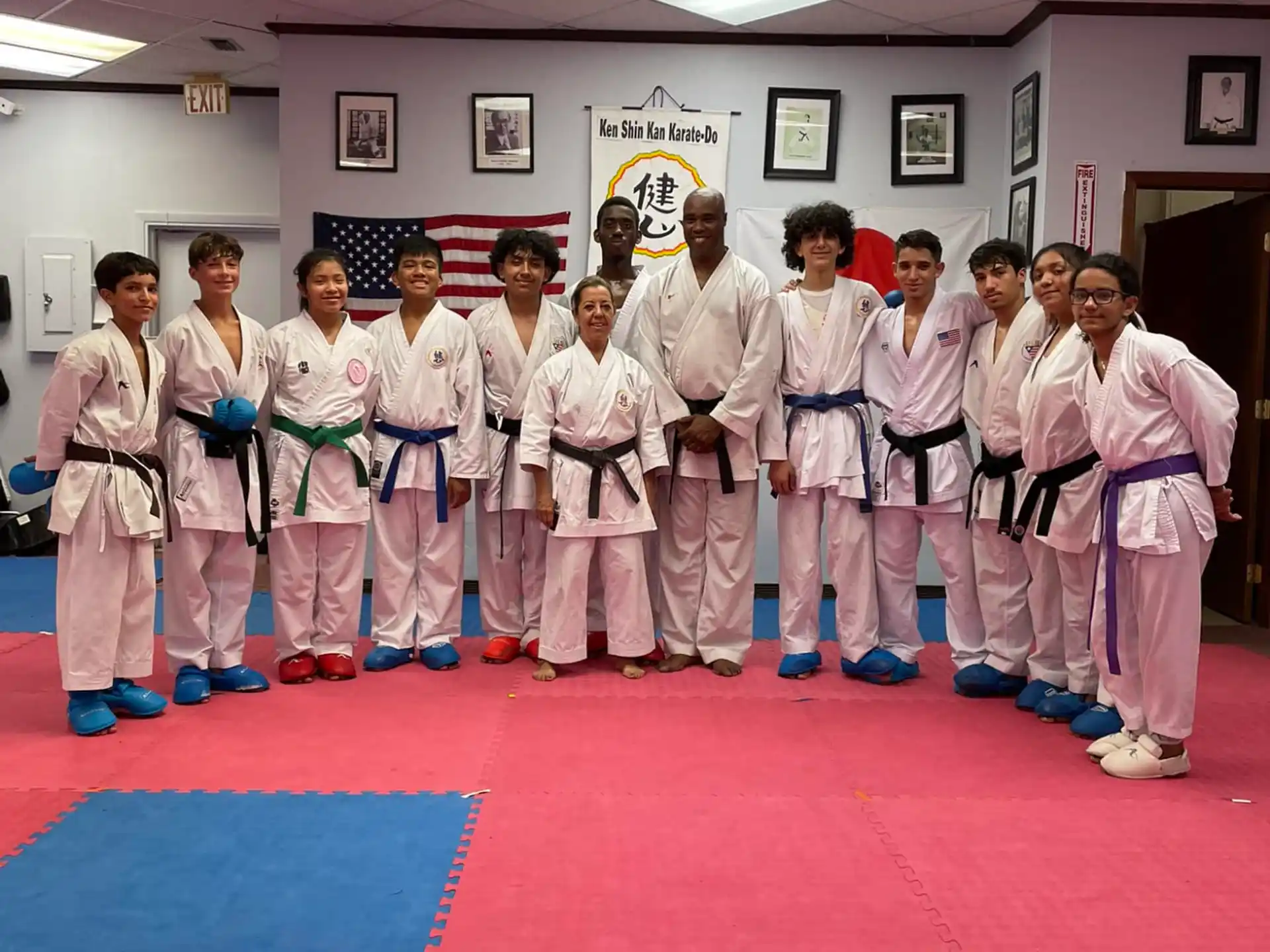 a group of people in karate uniforms