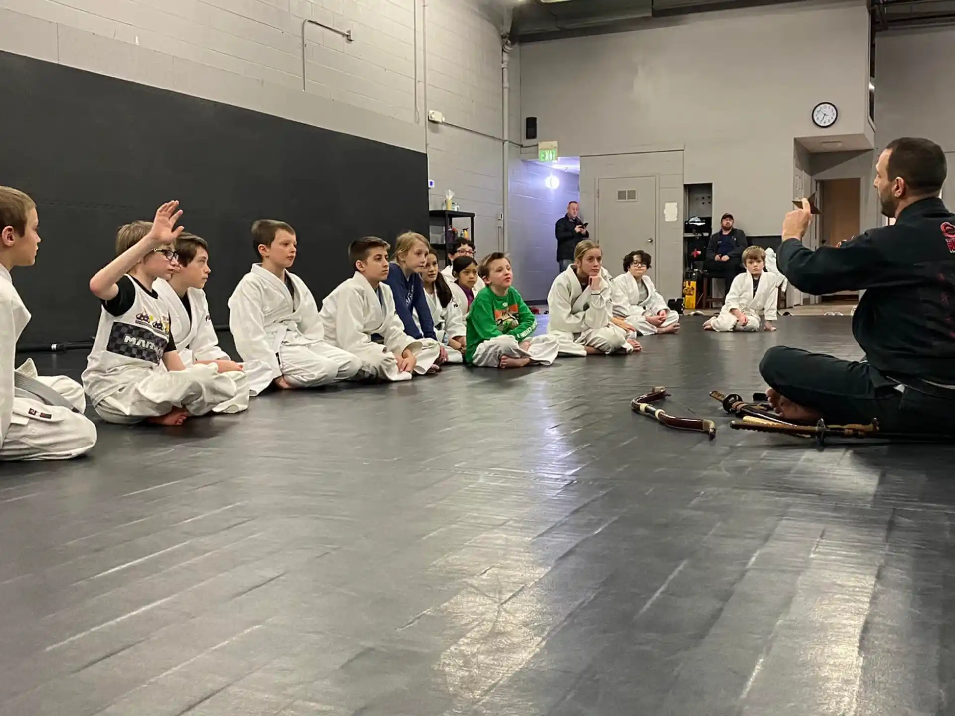 a group of people sitting on the floor