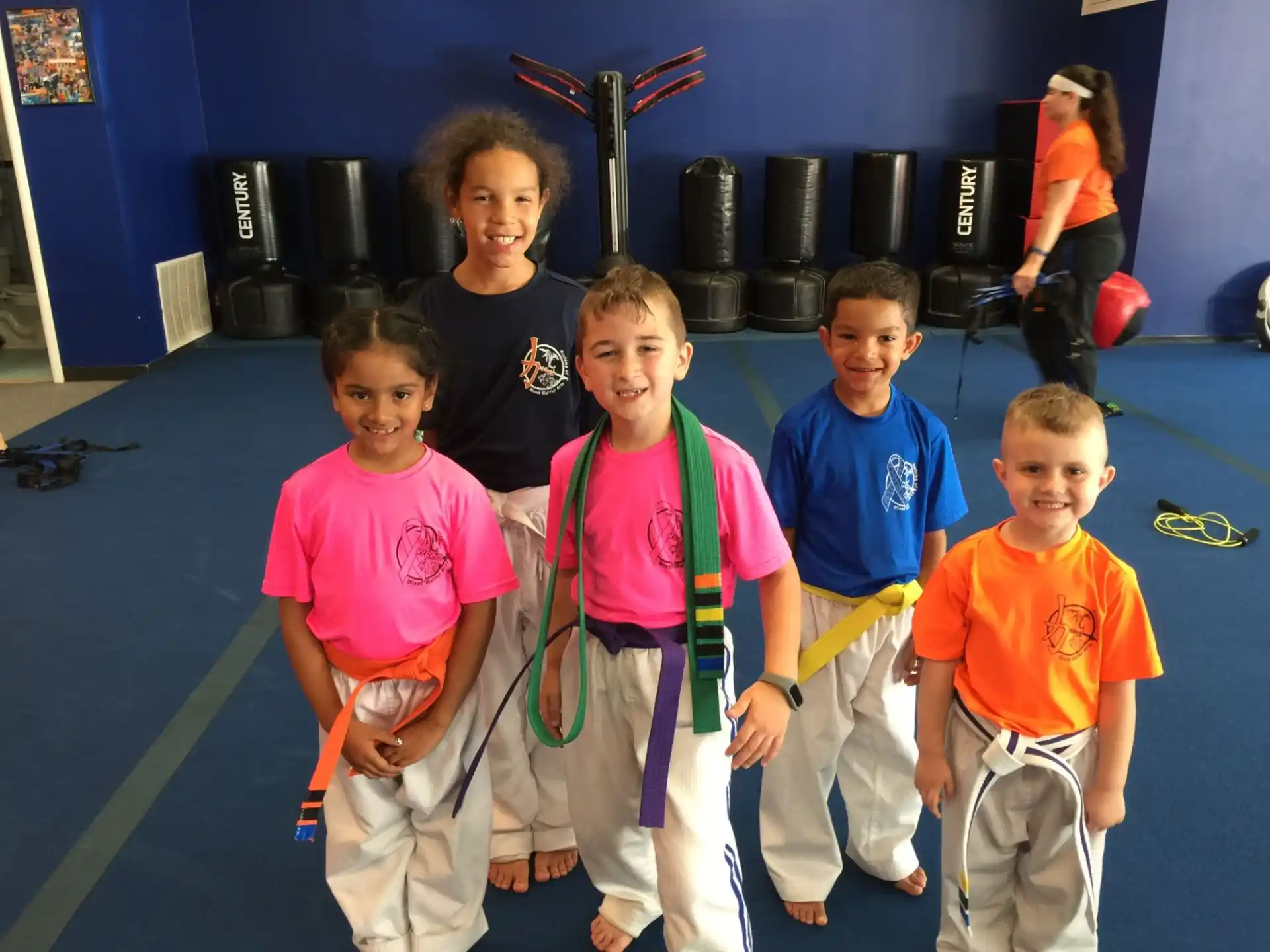 a group of kids posing for a photo