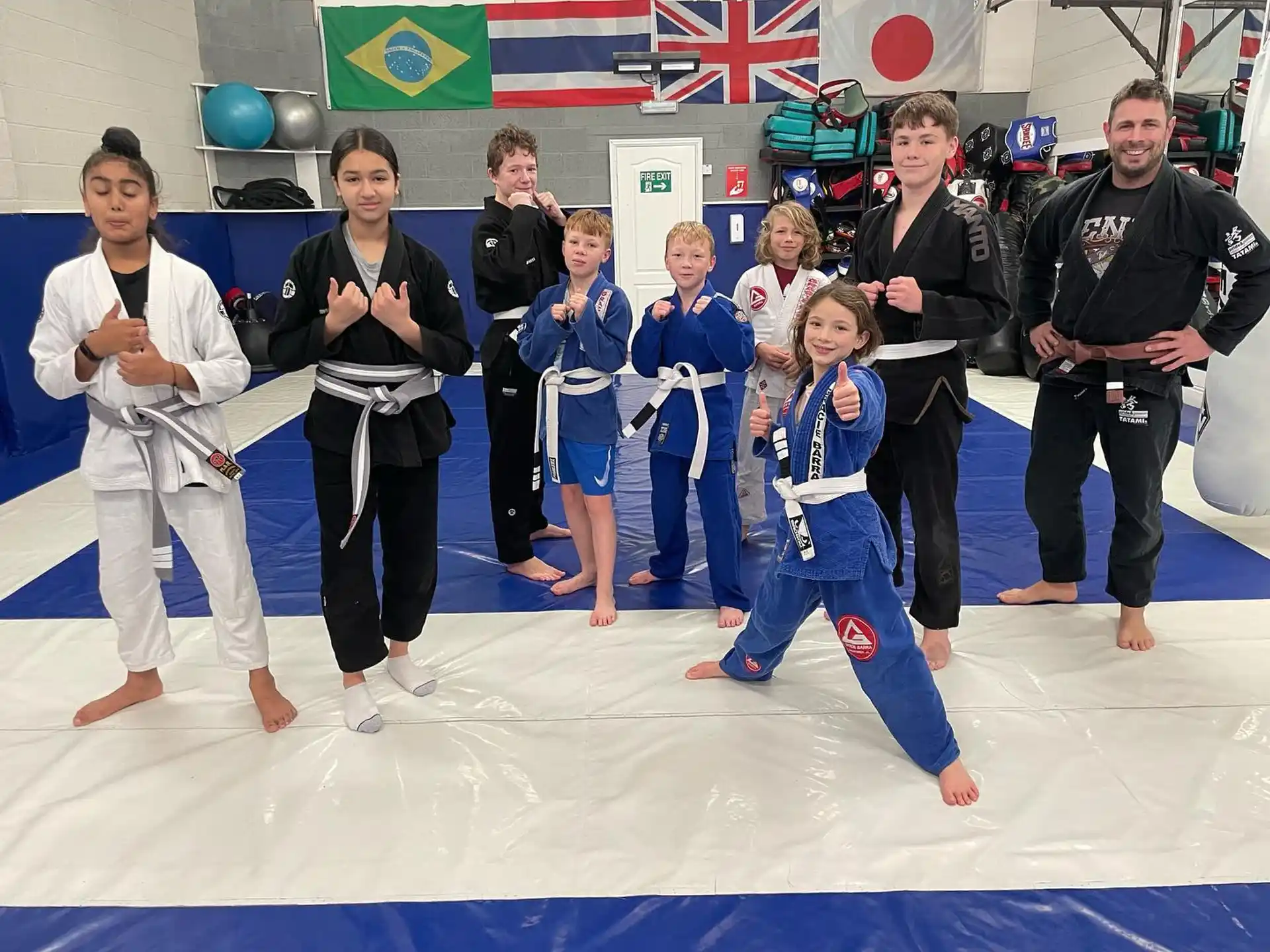 a group of people in karate uniforms