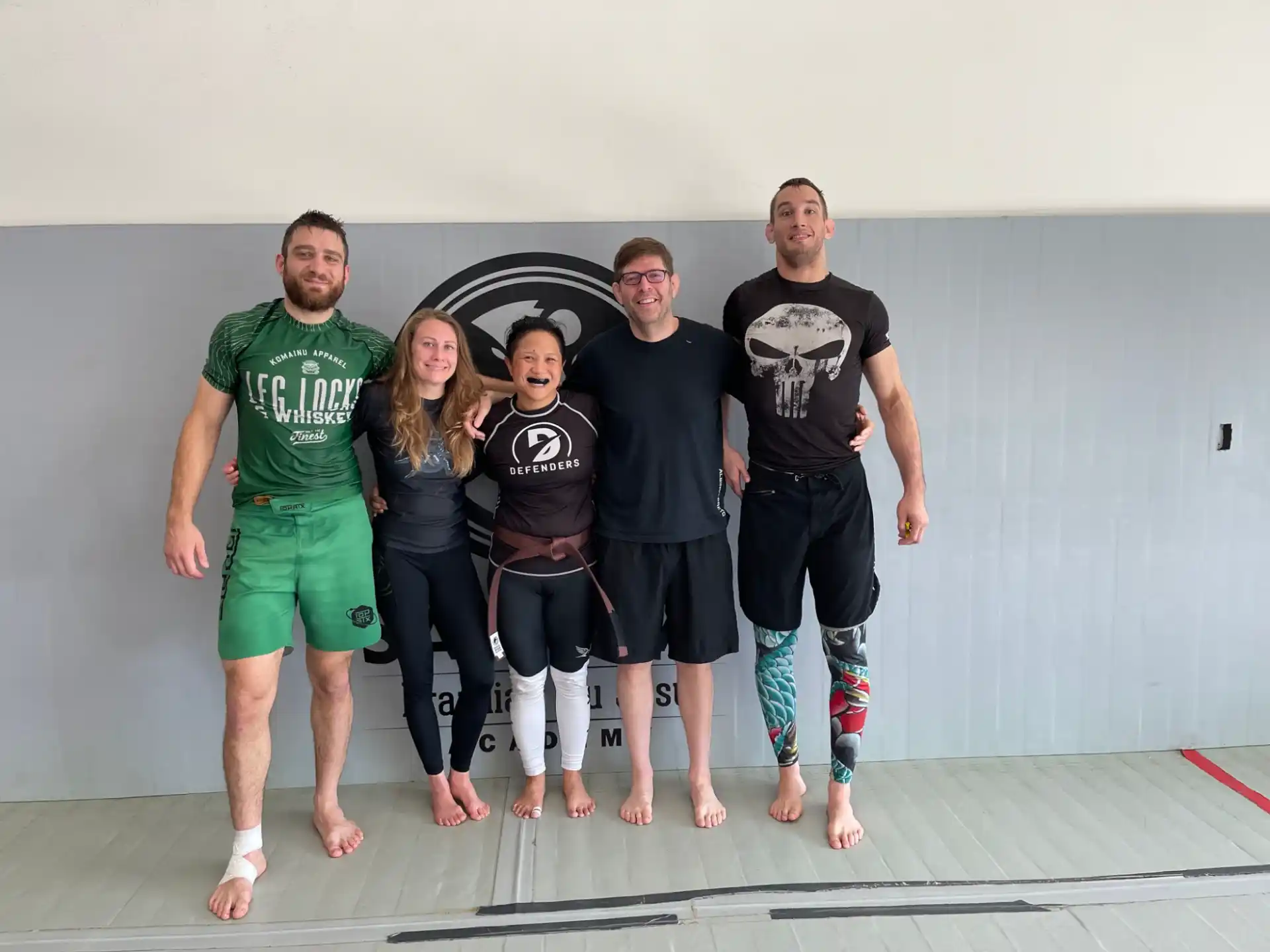 a group of people posing for a photo
