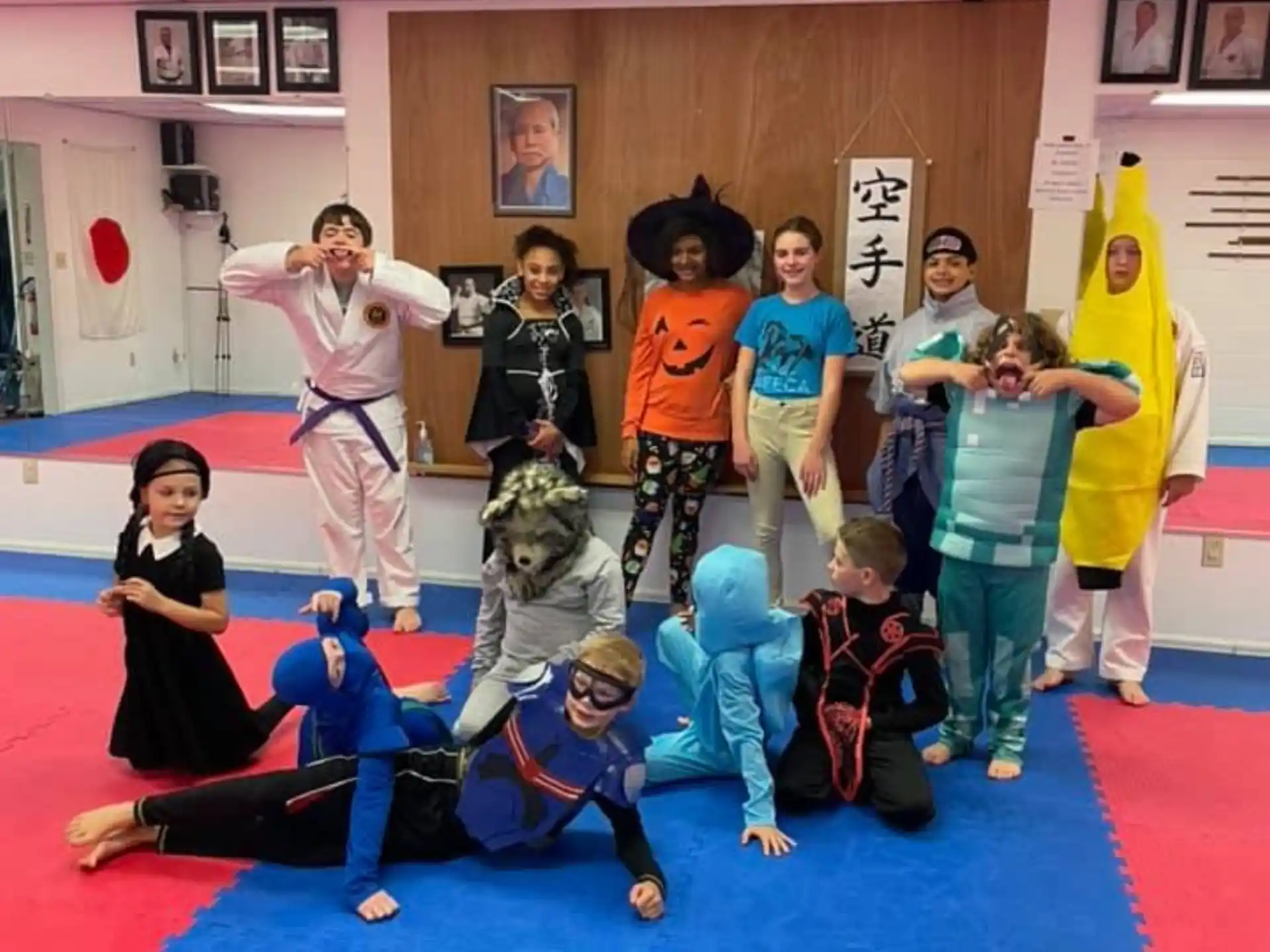 a group of kids posing for a photo