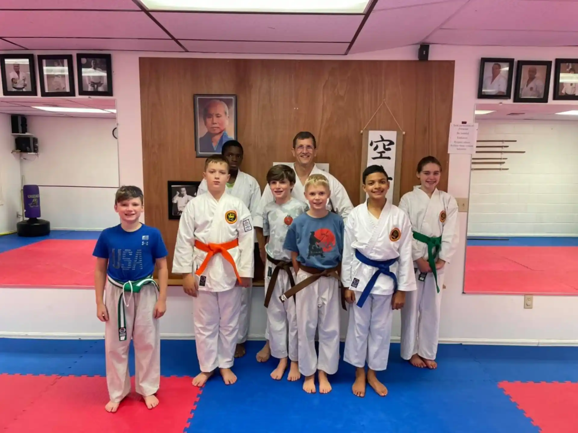 a group of people wearing karate uniforms