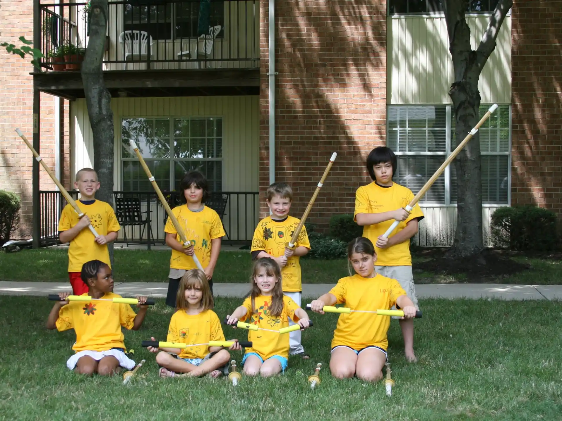a group of kids posing for a photo
