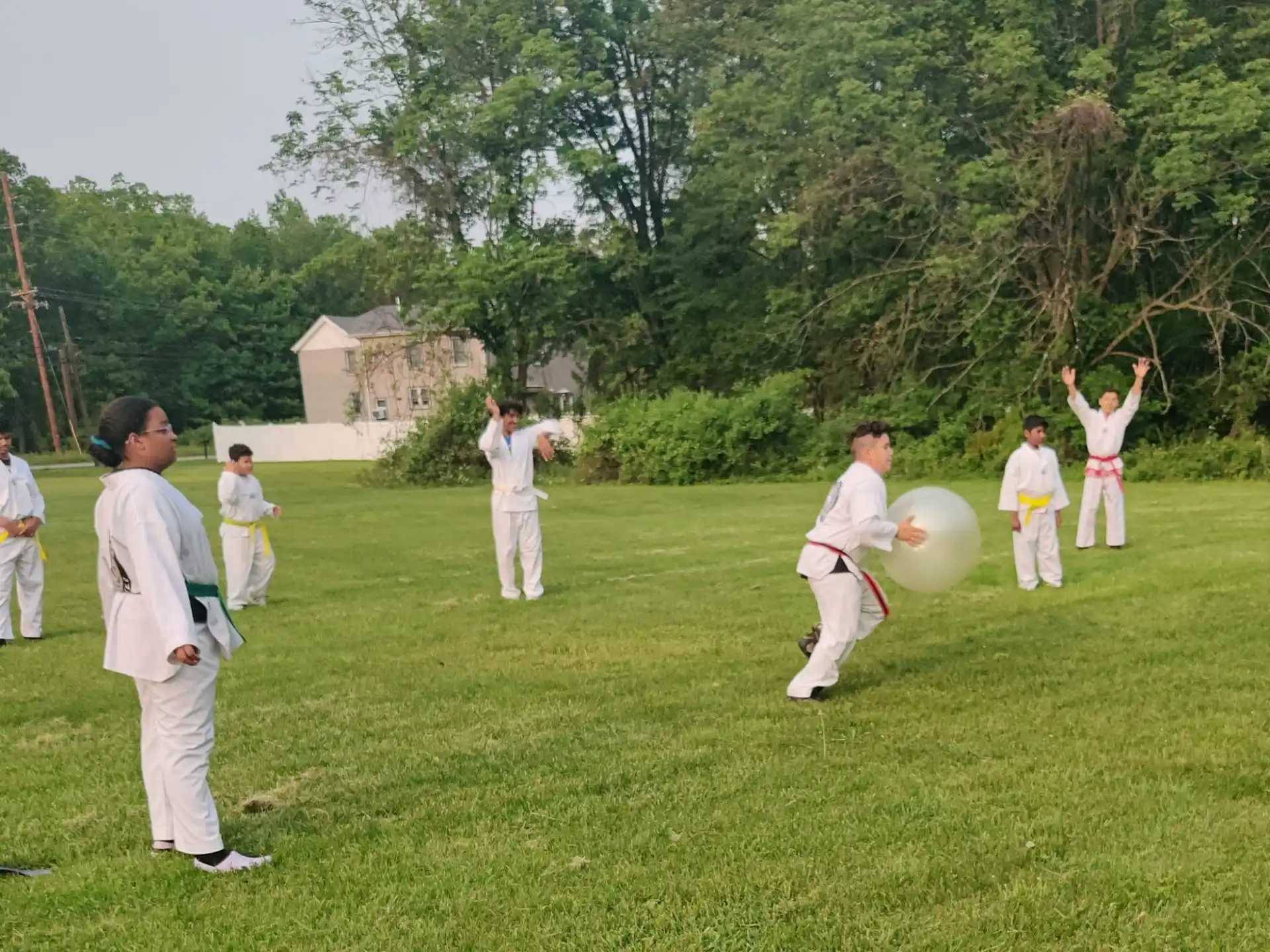 a group of people playing baseball
