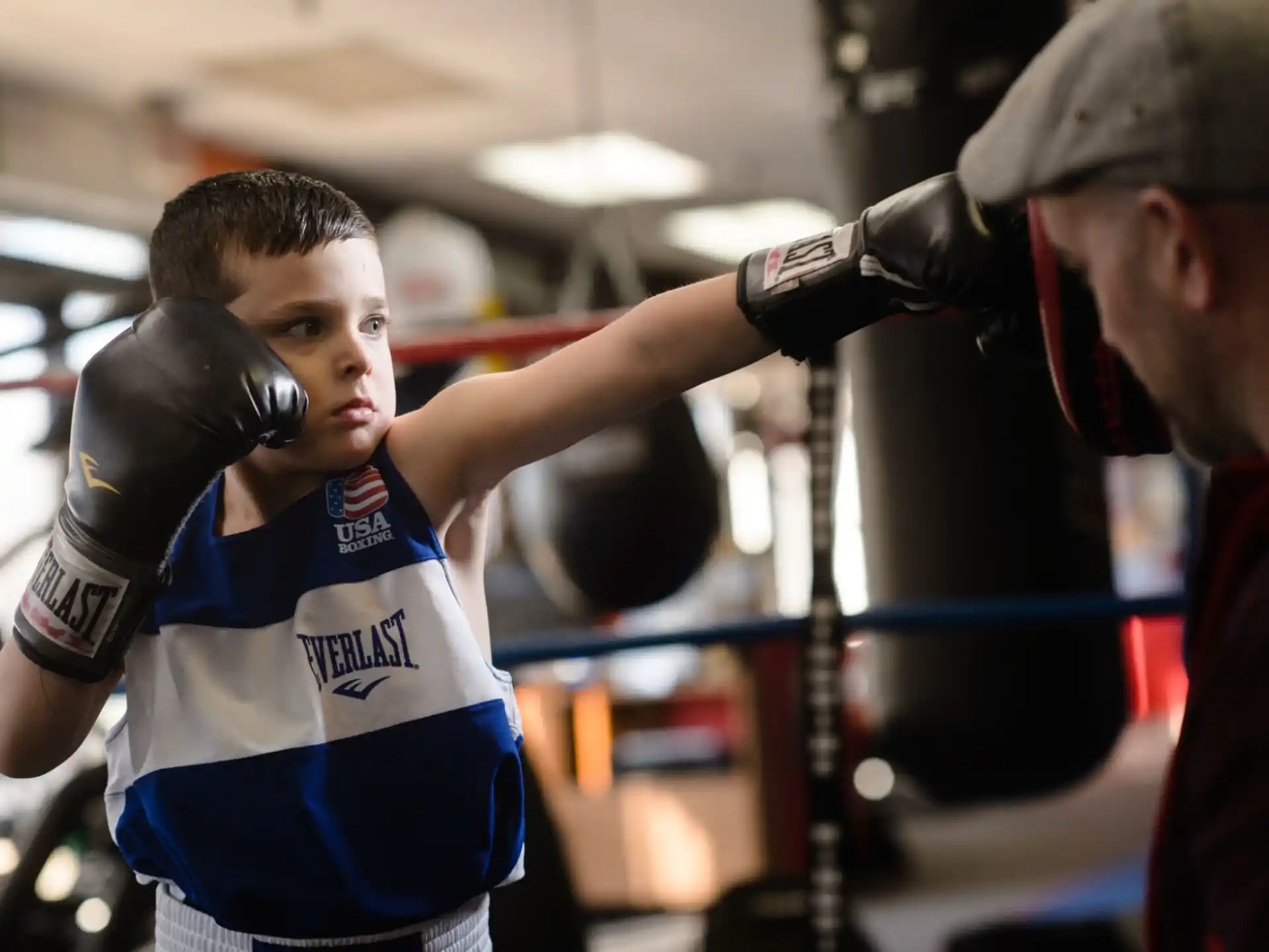 a man wearing boxing gloves