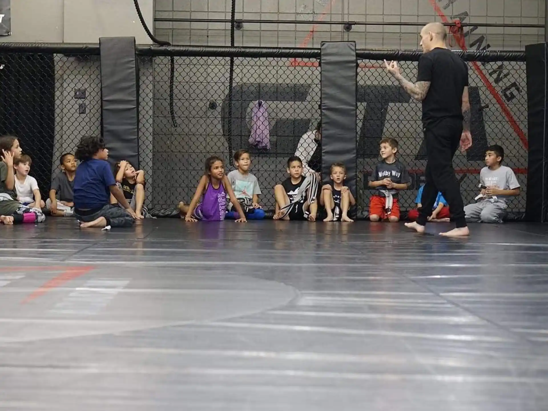a group of people sitting on the floor