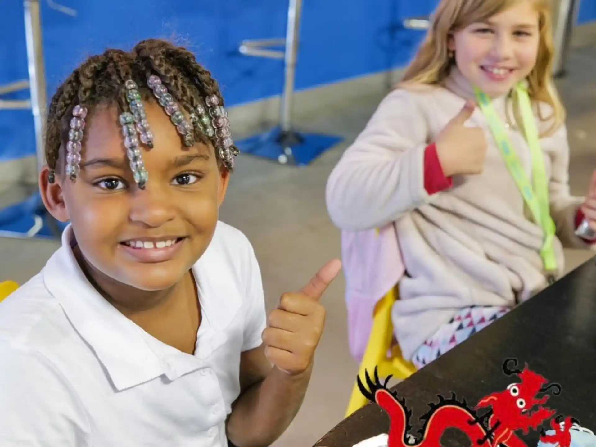 a boy and girl smiling